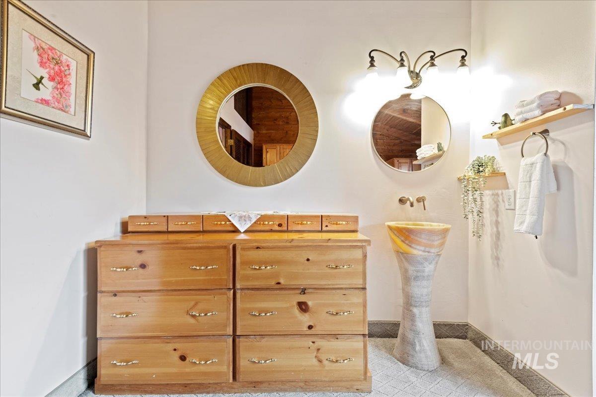 Master bedroom dressing area, and small sink.