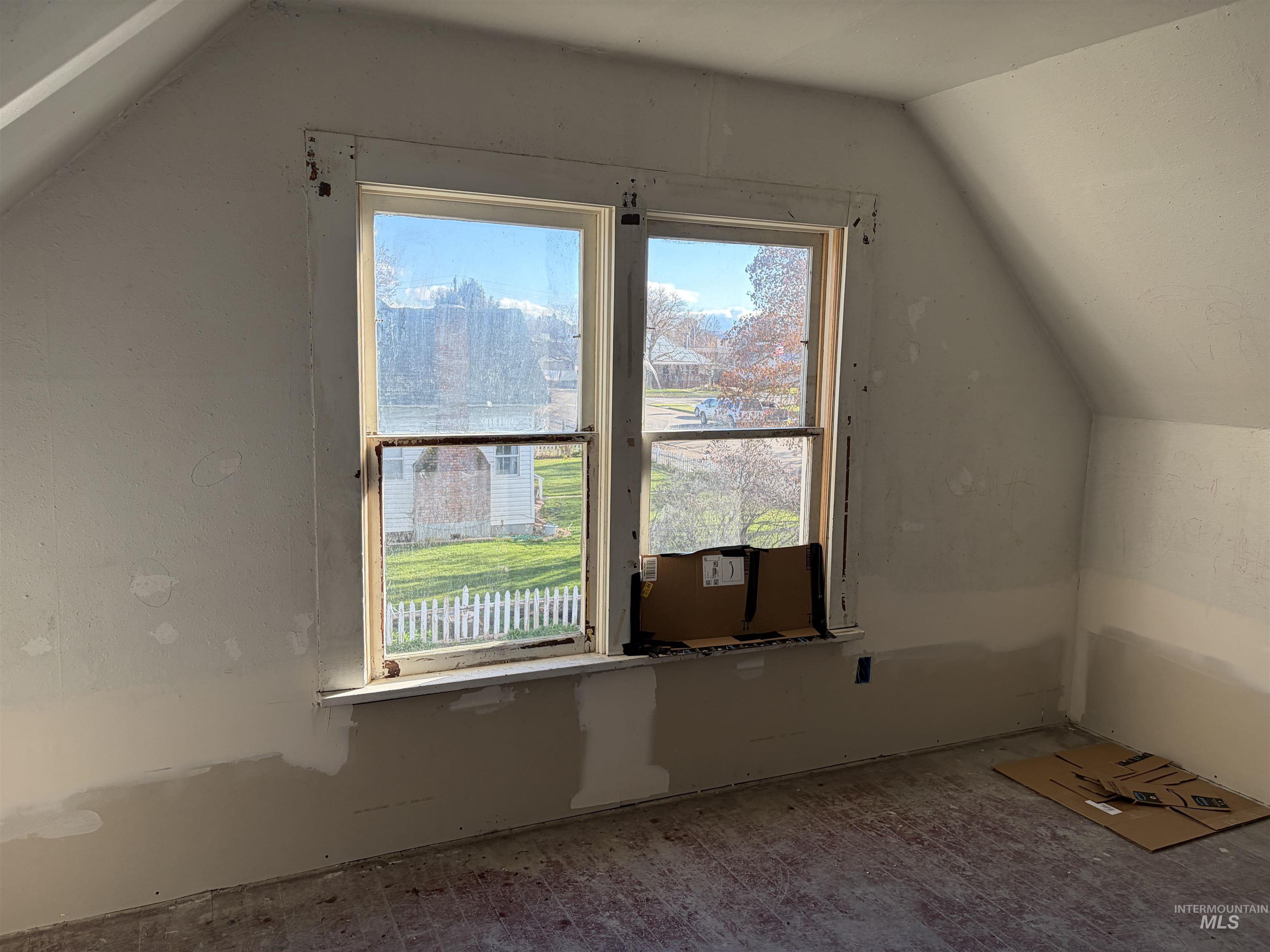 Bonus room featuring lofted ceiling