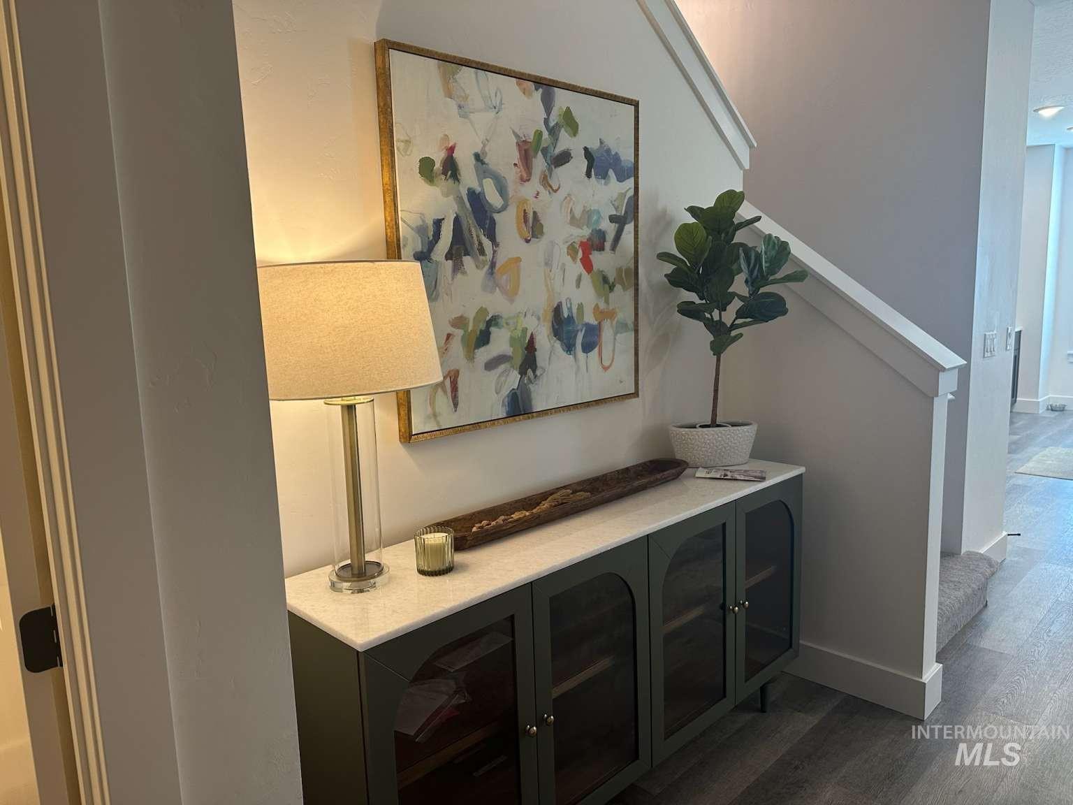 Detailed view of wood finished floors and baseboards