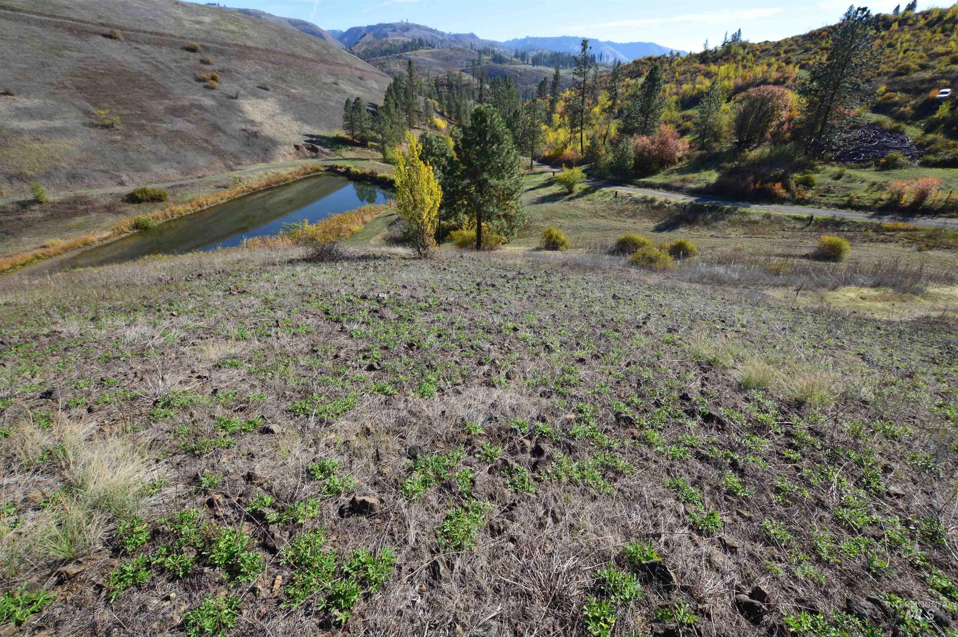 View of mountain background with a nearby body of water
