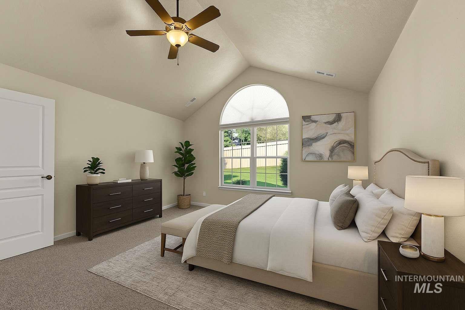 Bedroom featuring light carpet, lofted ceiling, and ceiling fan