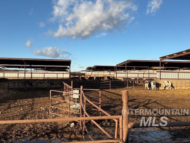 View of yard with an outdoor structure and an exterior structure