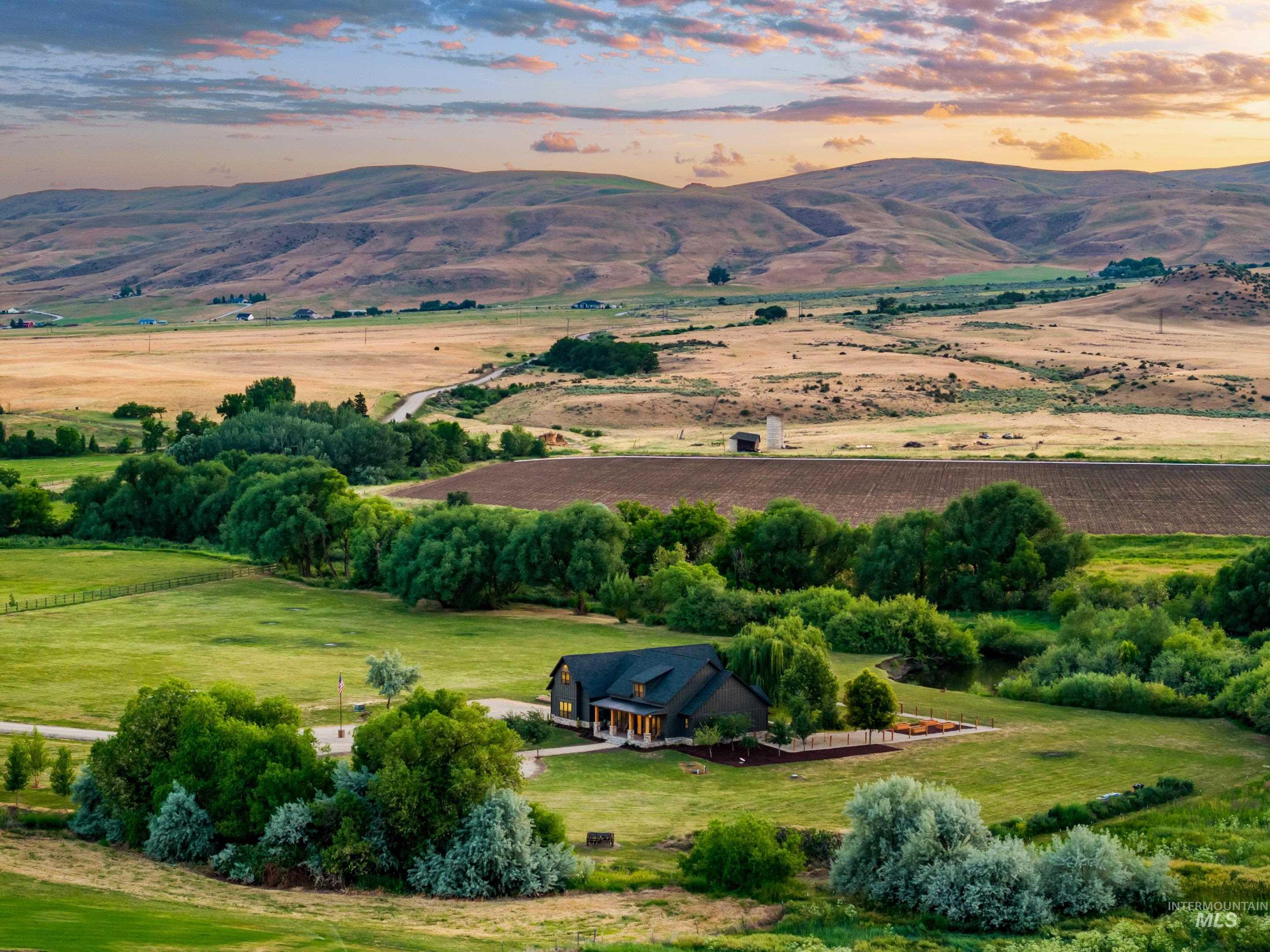 View of mountain background featuring rural landscape