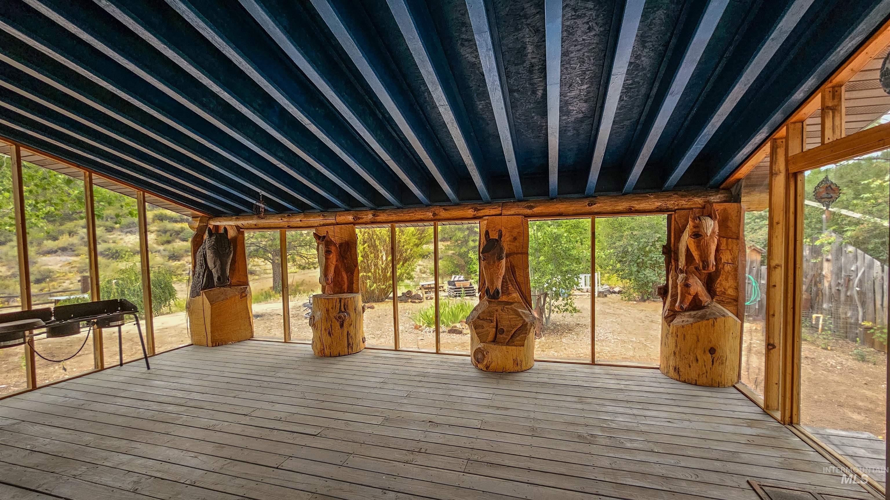 Unfurnished sunroom with healthy amount of natural light