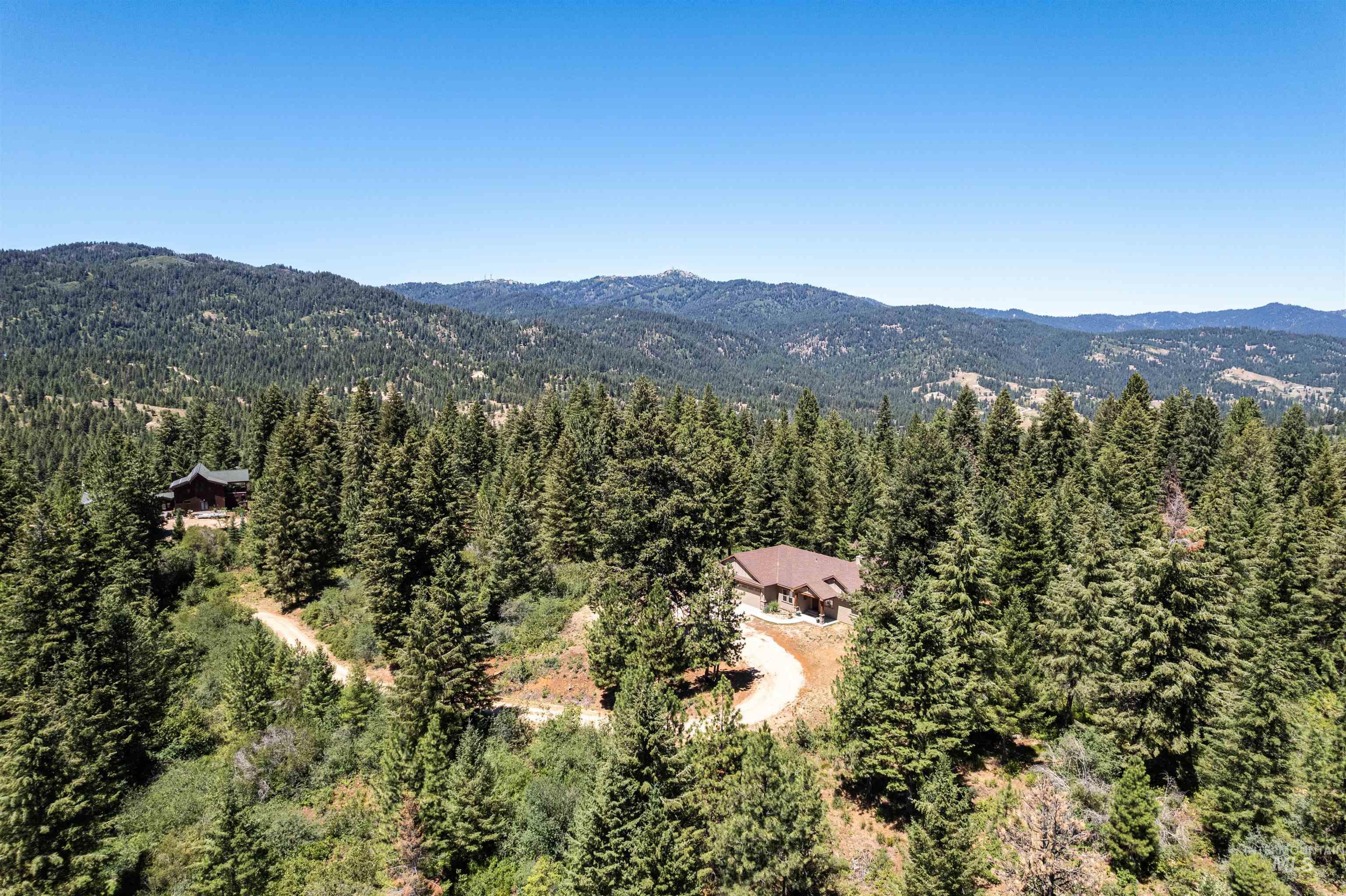 Mountain view featuring a heavily wooded area