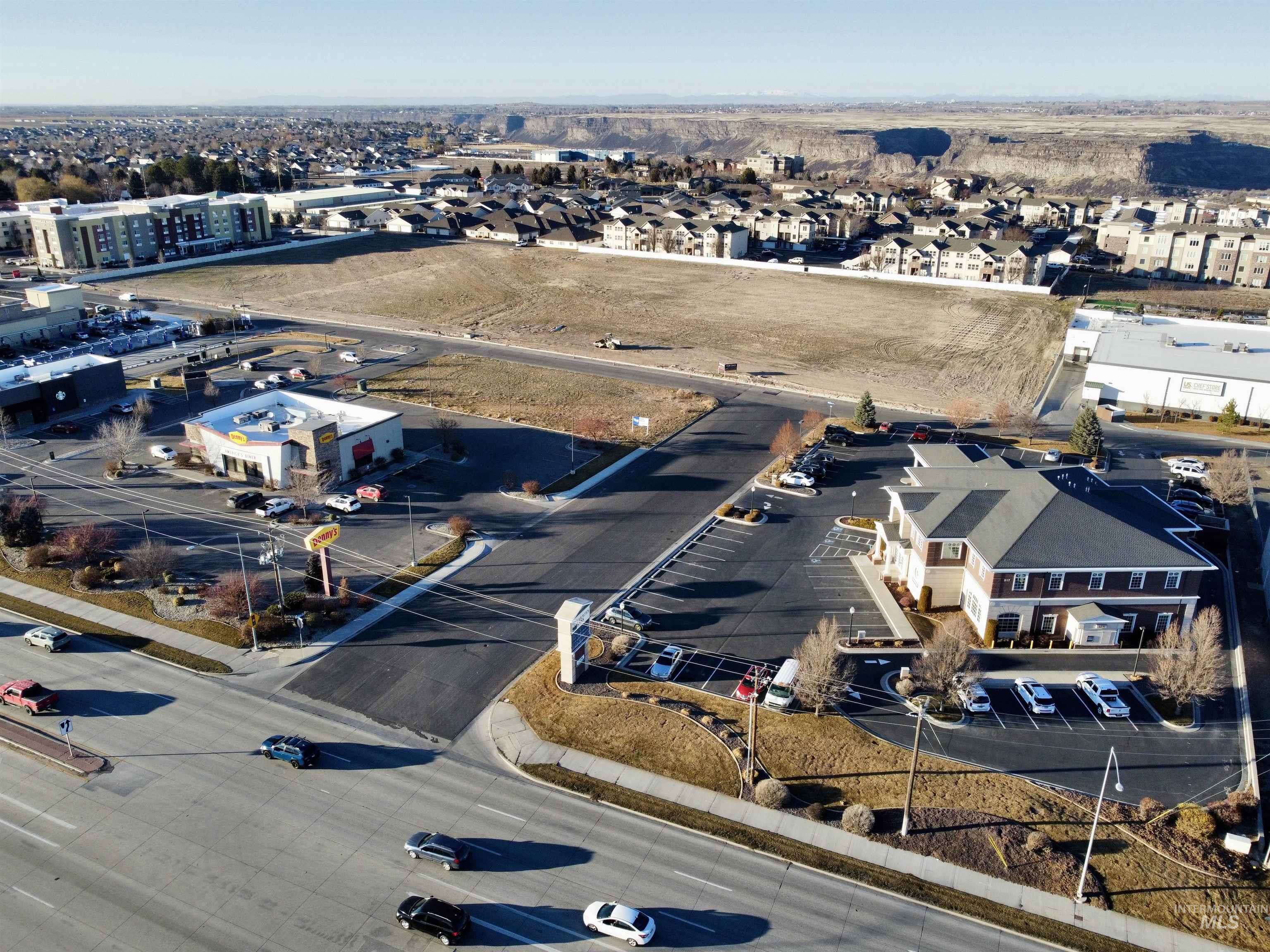 View of property location featuring nearby suburban area