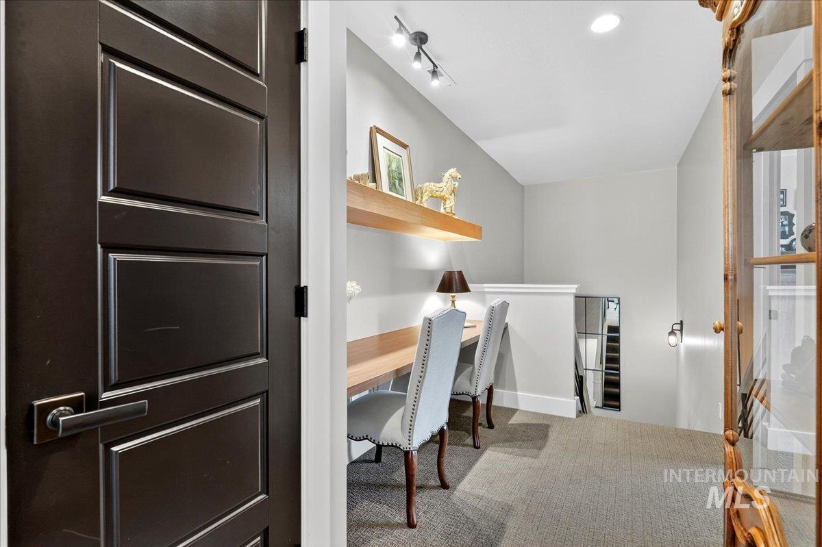 View of carpeted home office