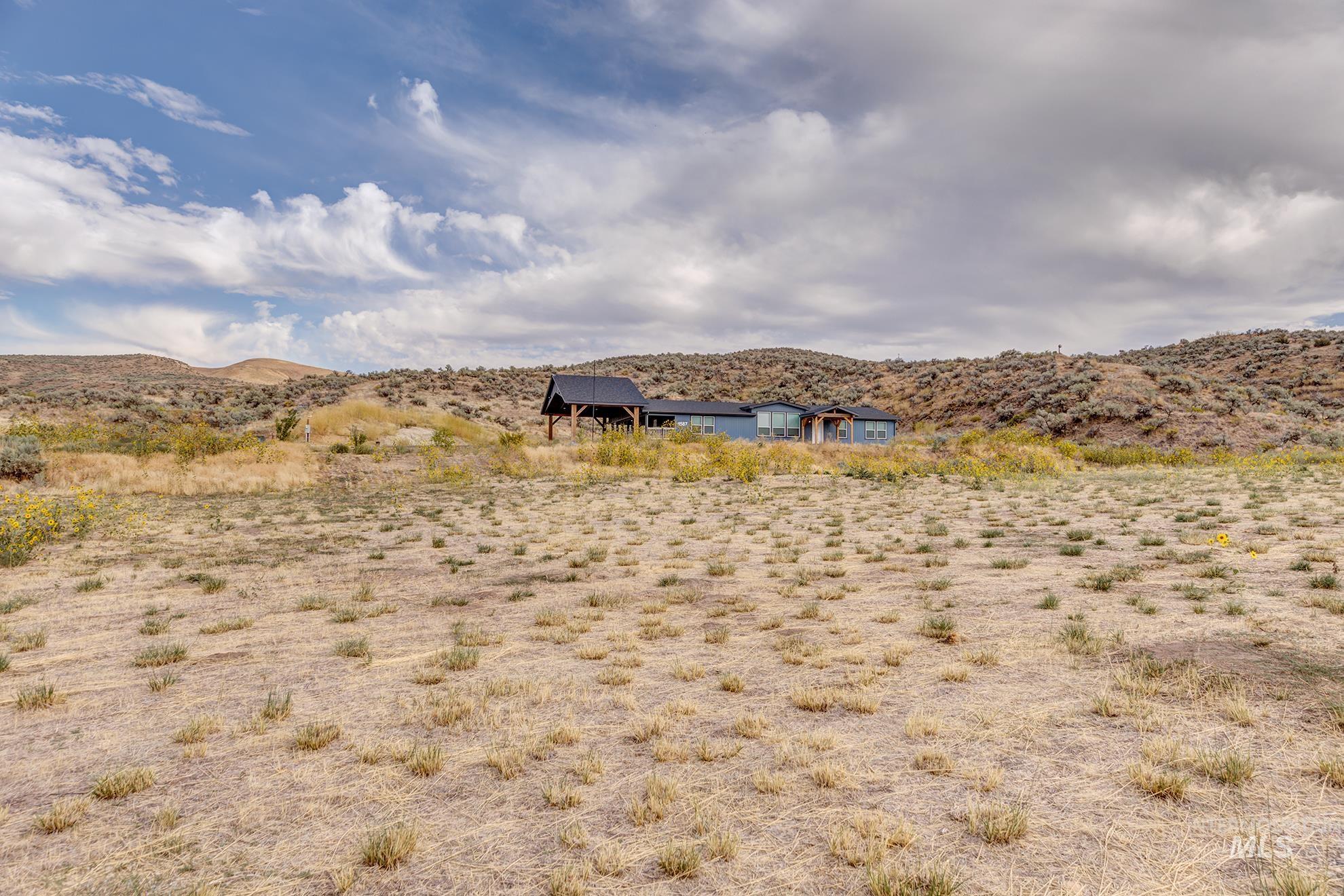 View of yard with a mountain view