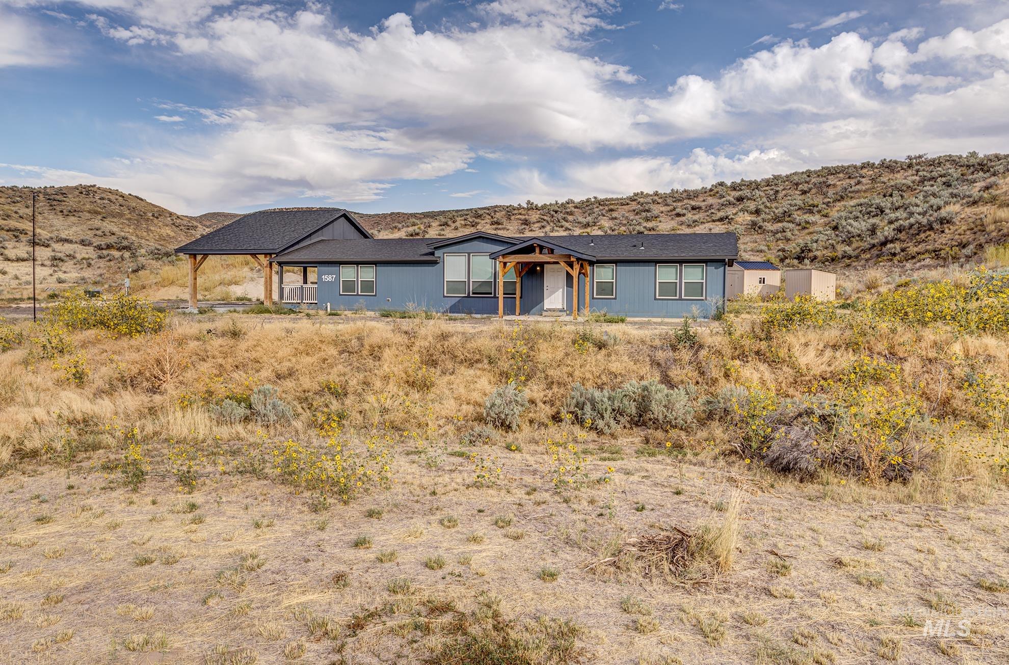 Single story home featuring a mountain view