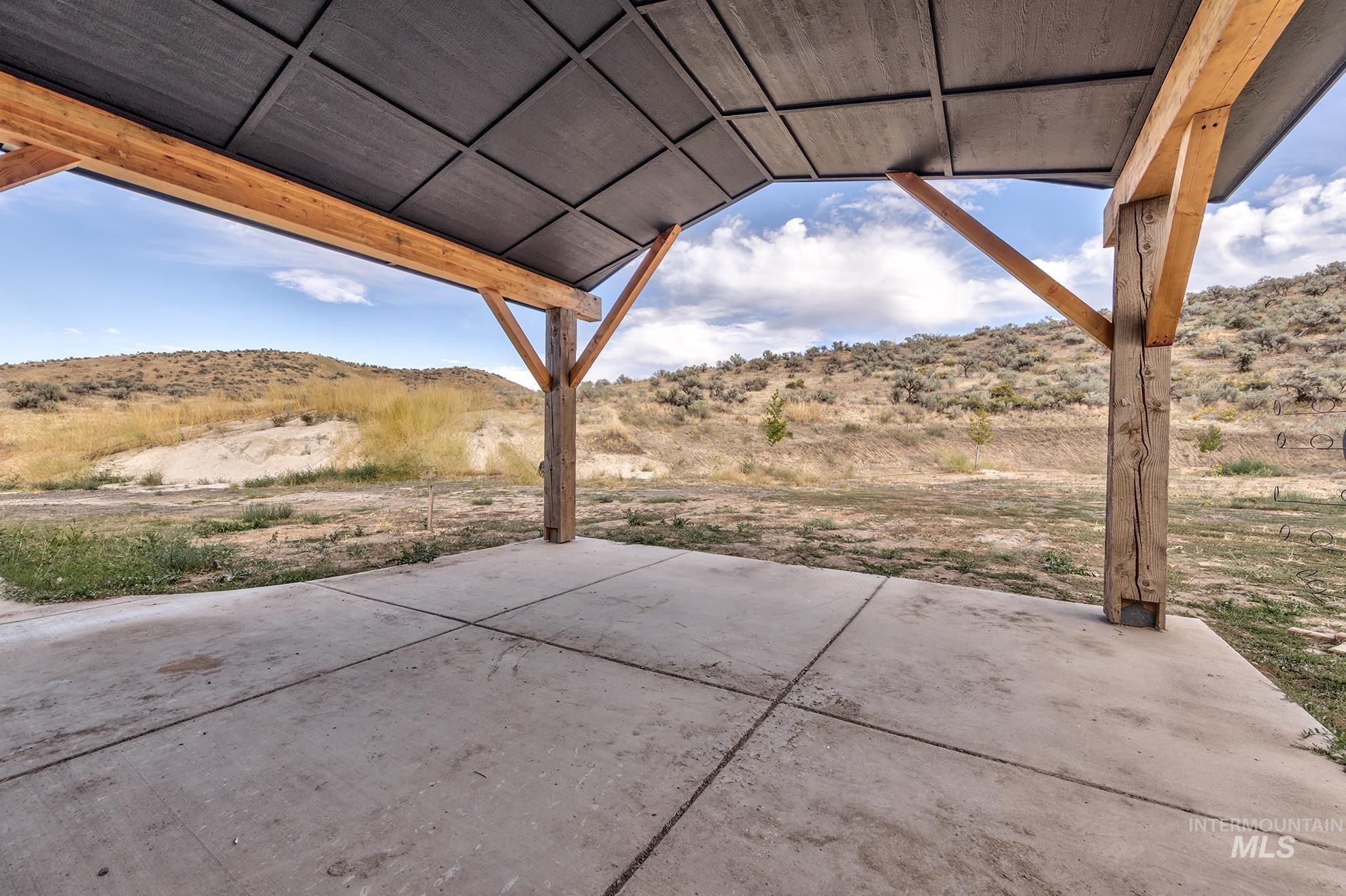 View of patio with a mountain view