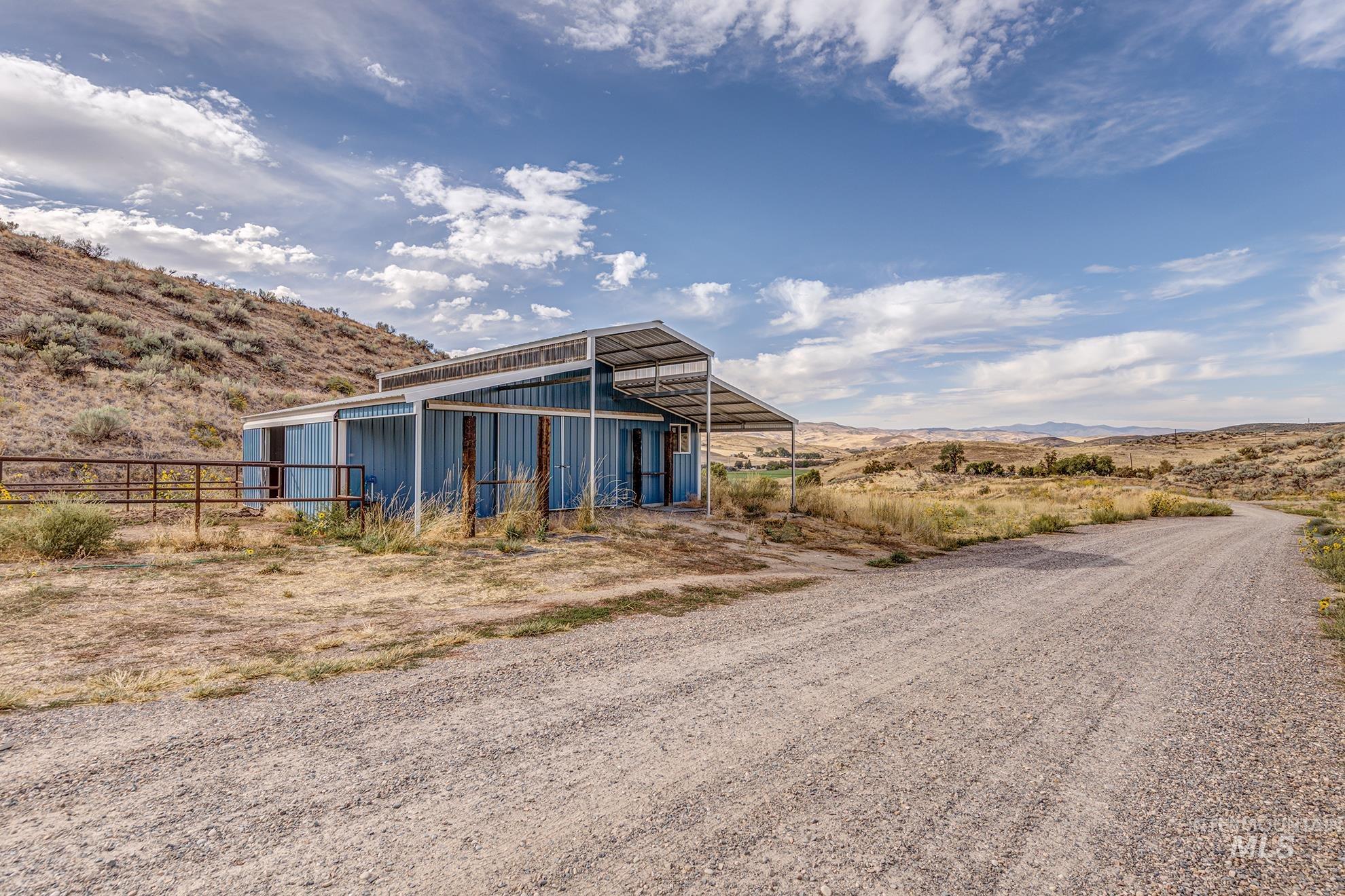 View of pole building featuring a mountain view