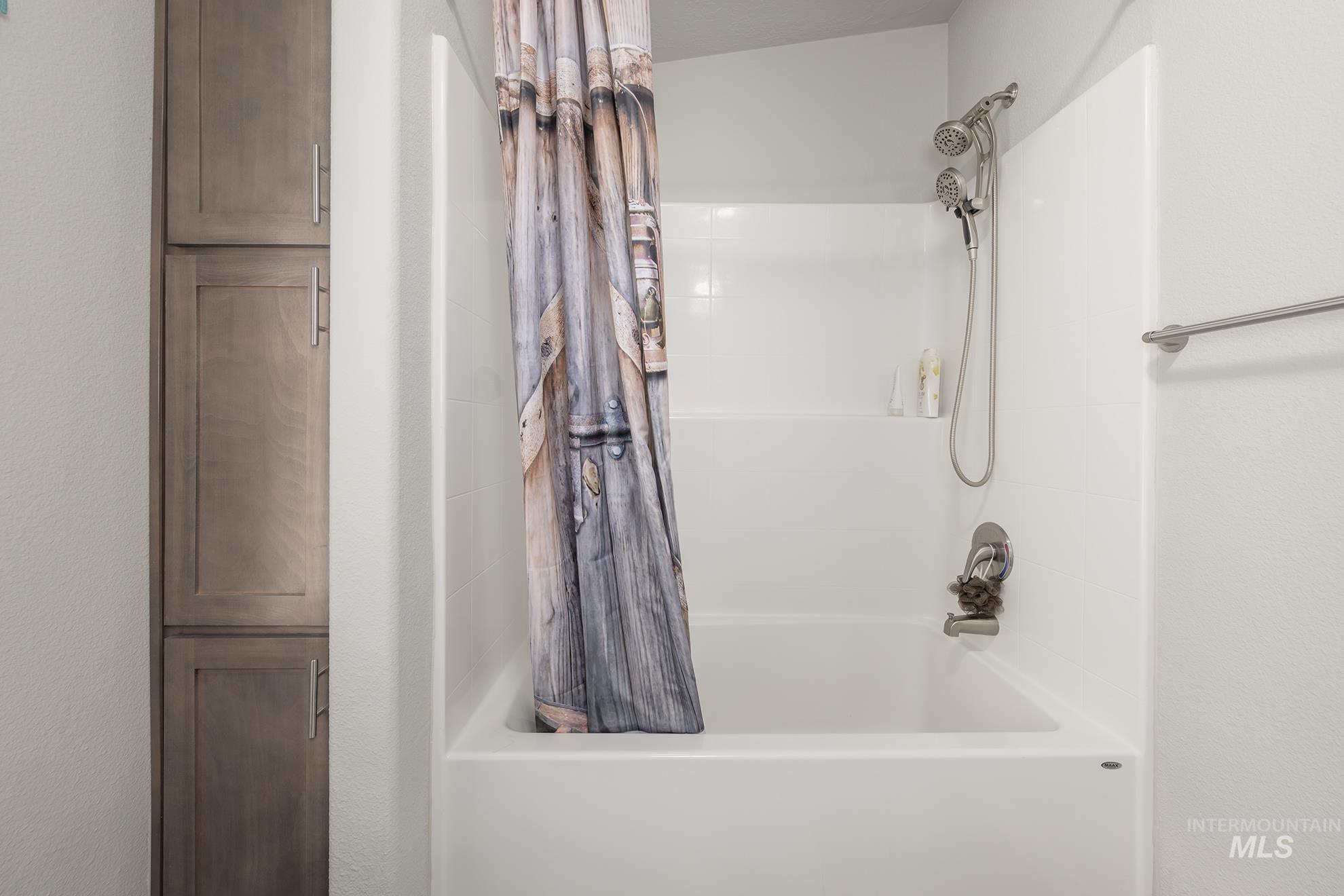 Bathroom featuring shower / bath combo