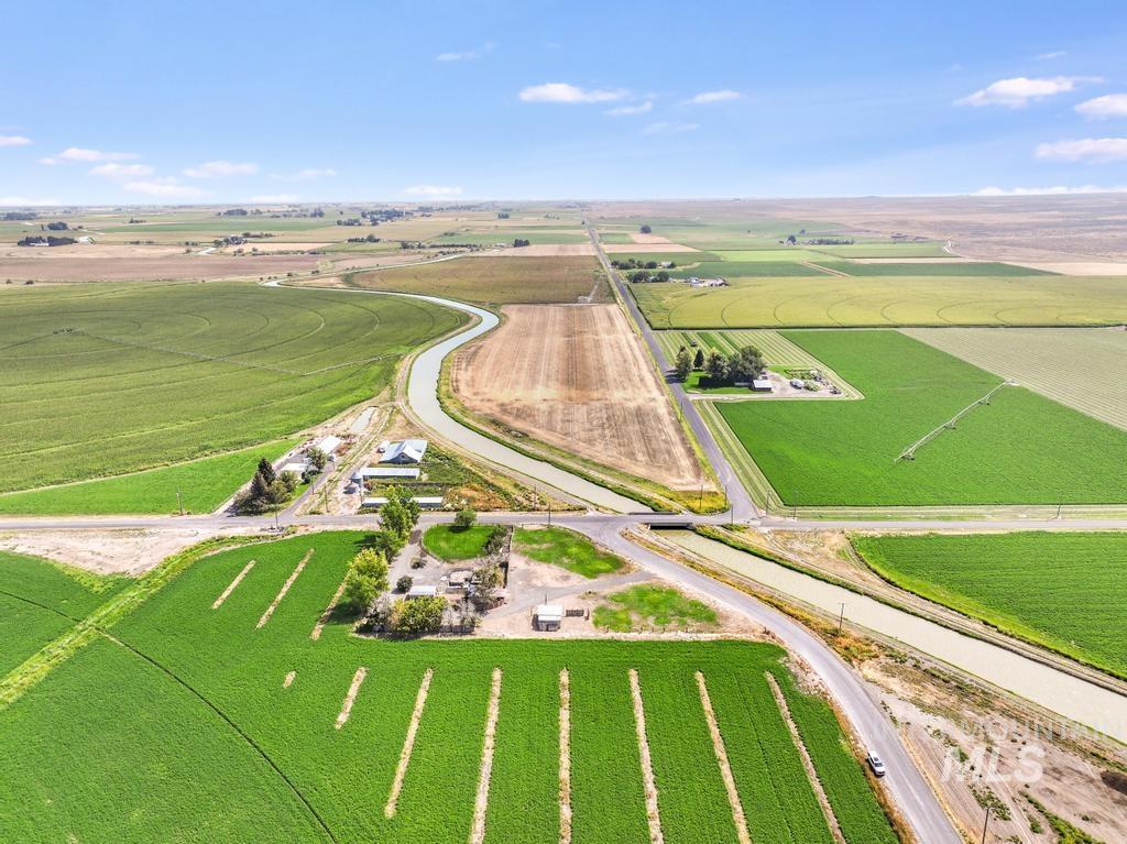 Aerial view of sparsely populated area with extensive farmland