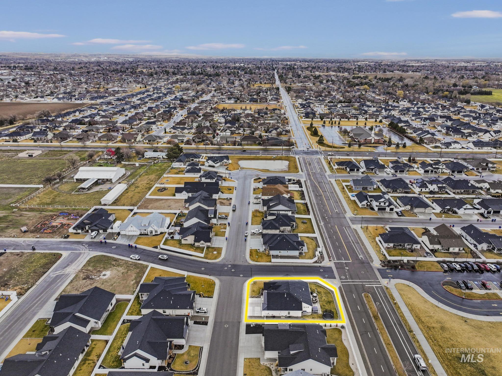 View of property location with nearby suburban area