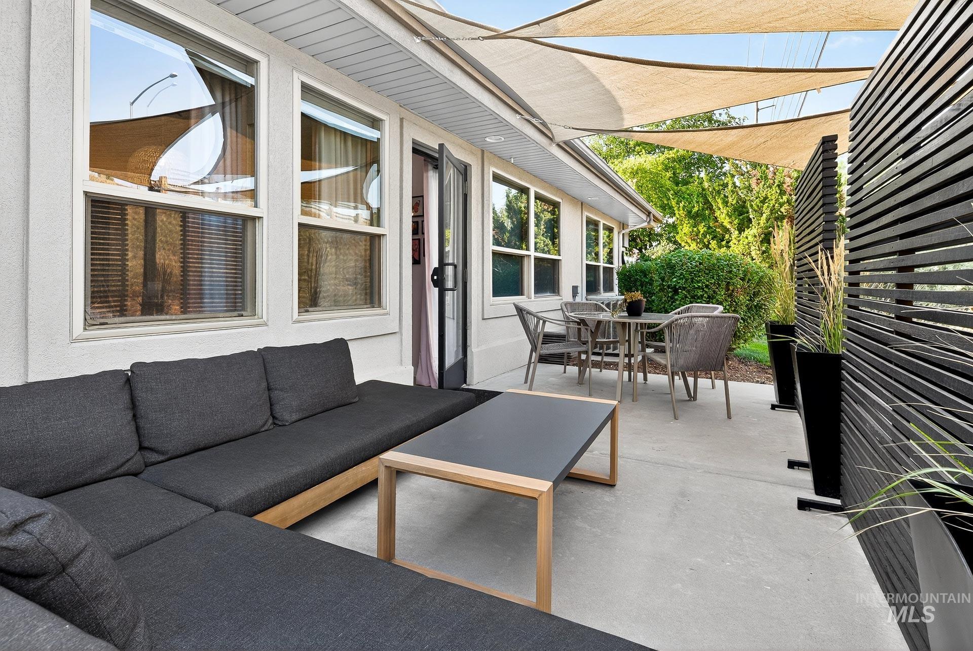 View of patio / terrace with outdoor dining space and an outdoor living space