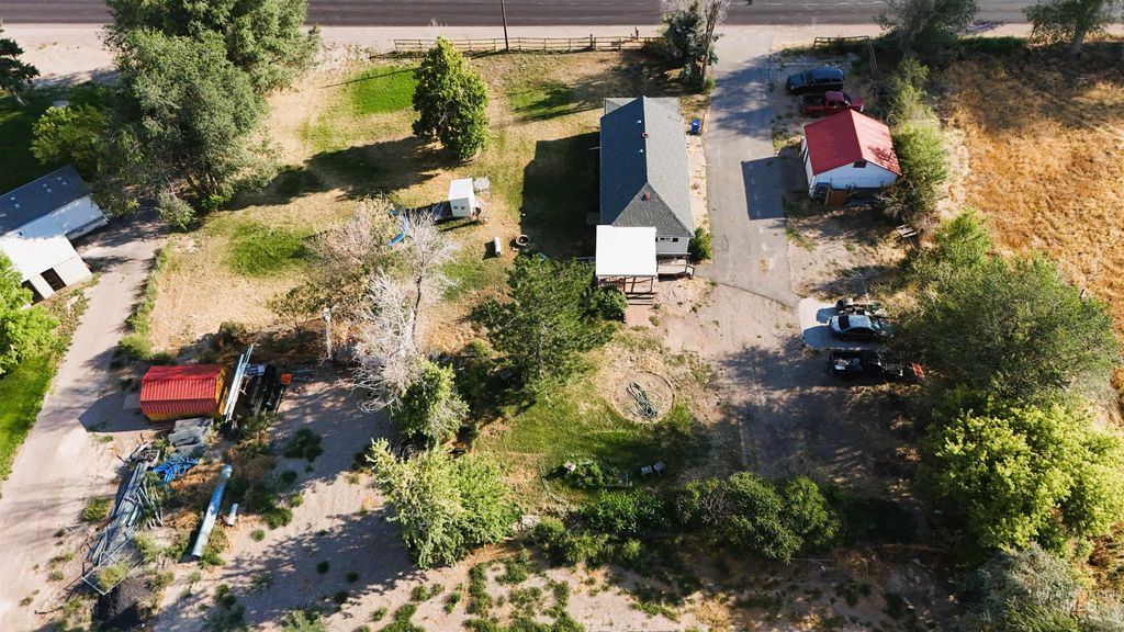 Photo of 12386 W Tyhee Rd, Pocatello, ID 83202 (MLS # 98960564)