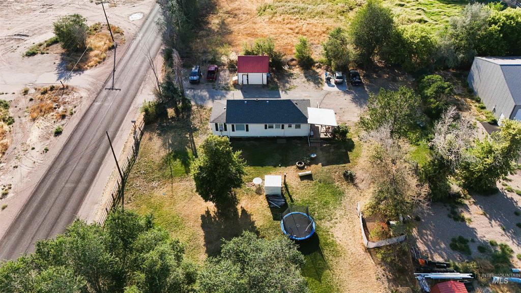 Photo of 12386 W Tyhee Rd, Pocatello, ID 83202 (MLS # 98960564)