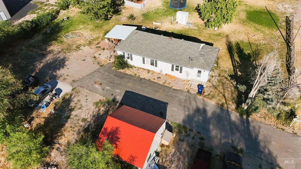 Photo of 12386 W Tyhee Rd, Pocatello, ID 83202 (MLS # 98960564)