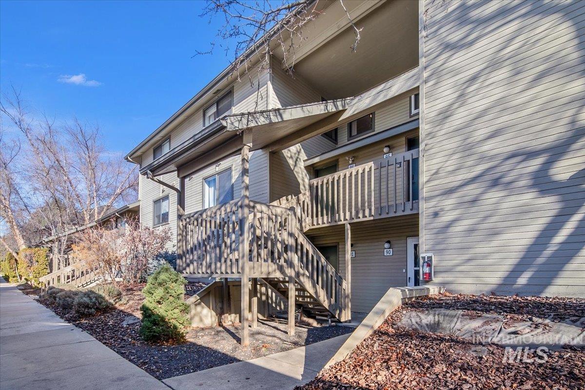 View of apartment building / complex with stairway