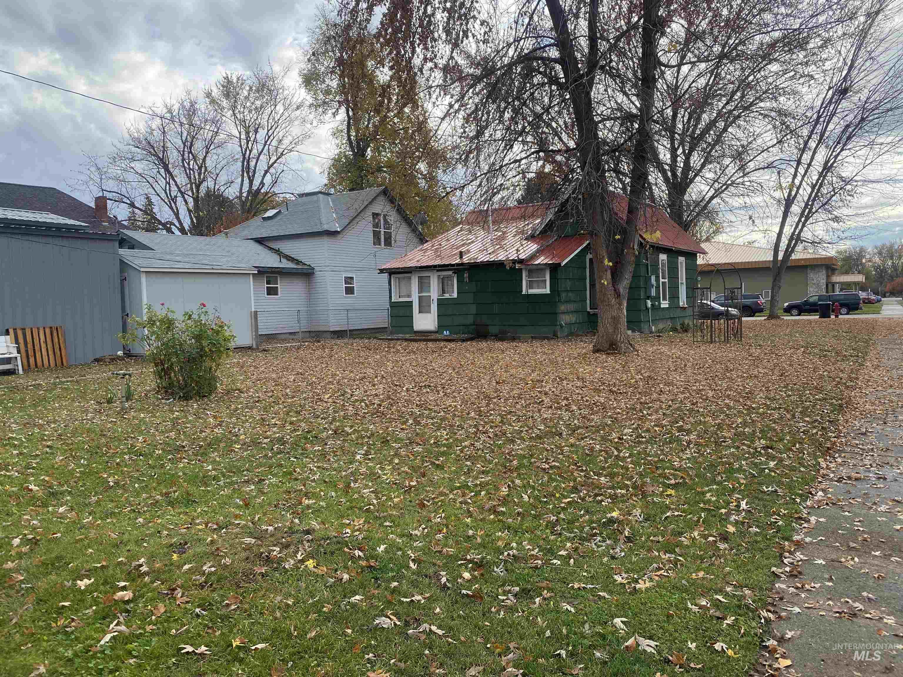 Rear view of property featuring a yard