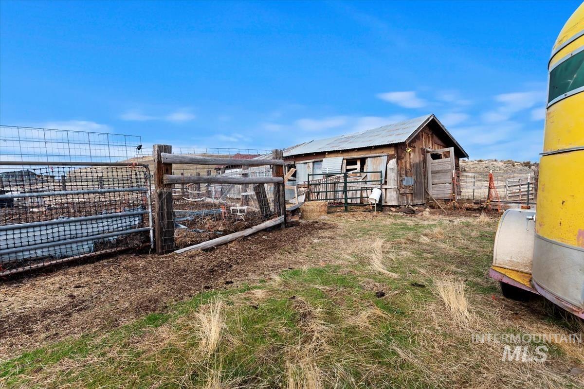 View of yard with an outbuilding