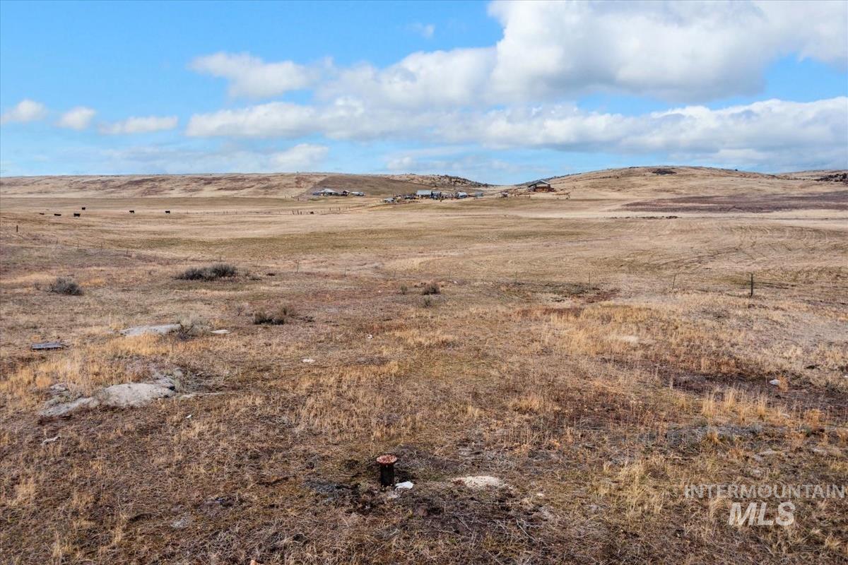 View of yard featuring a mountain view and a view of countryside