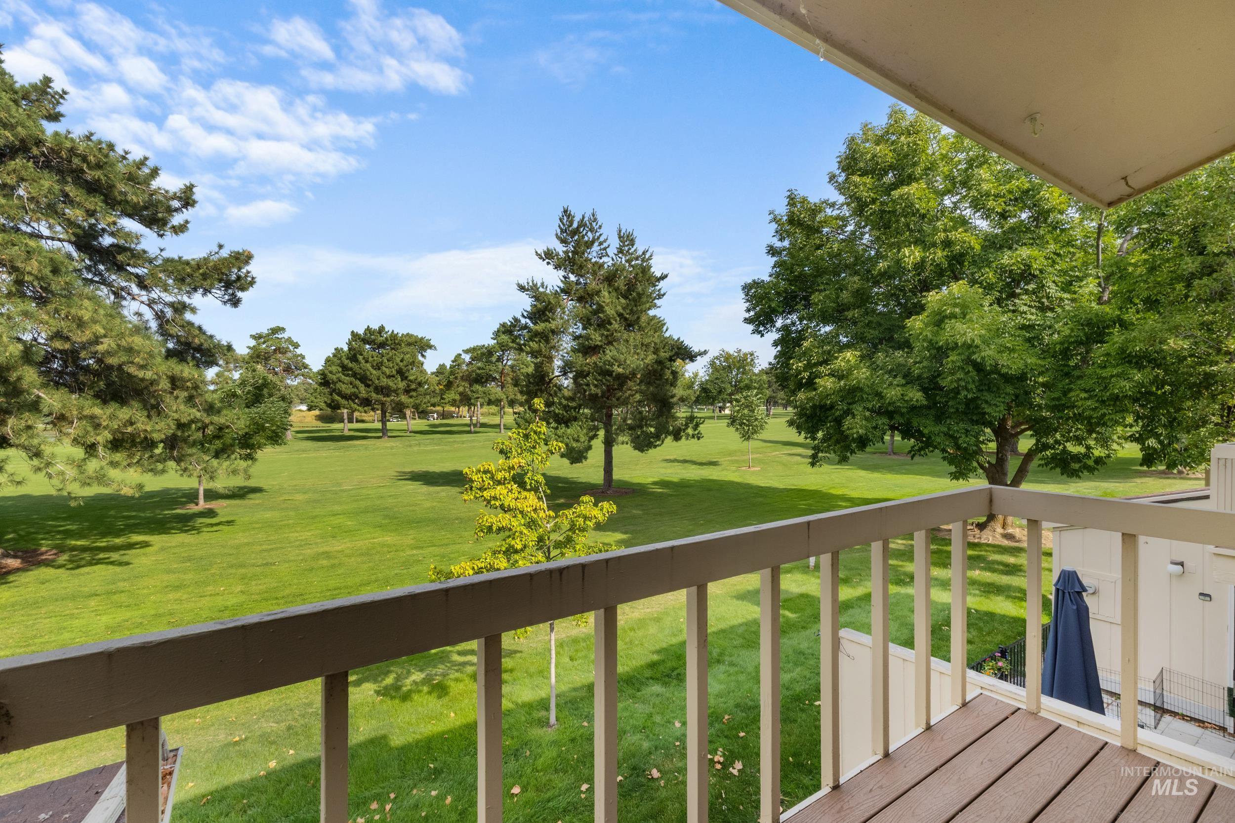 Wooden deck featuring a yard