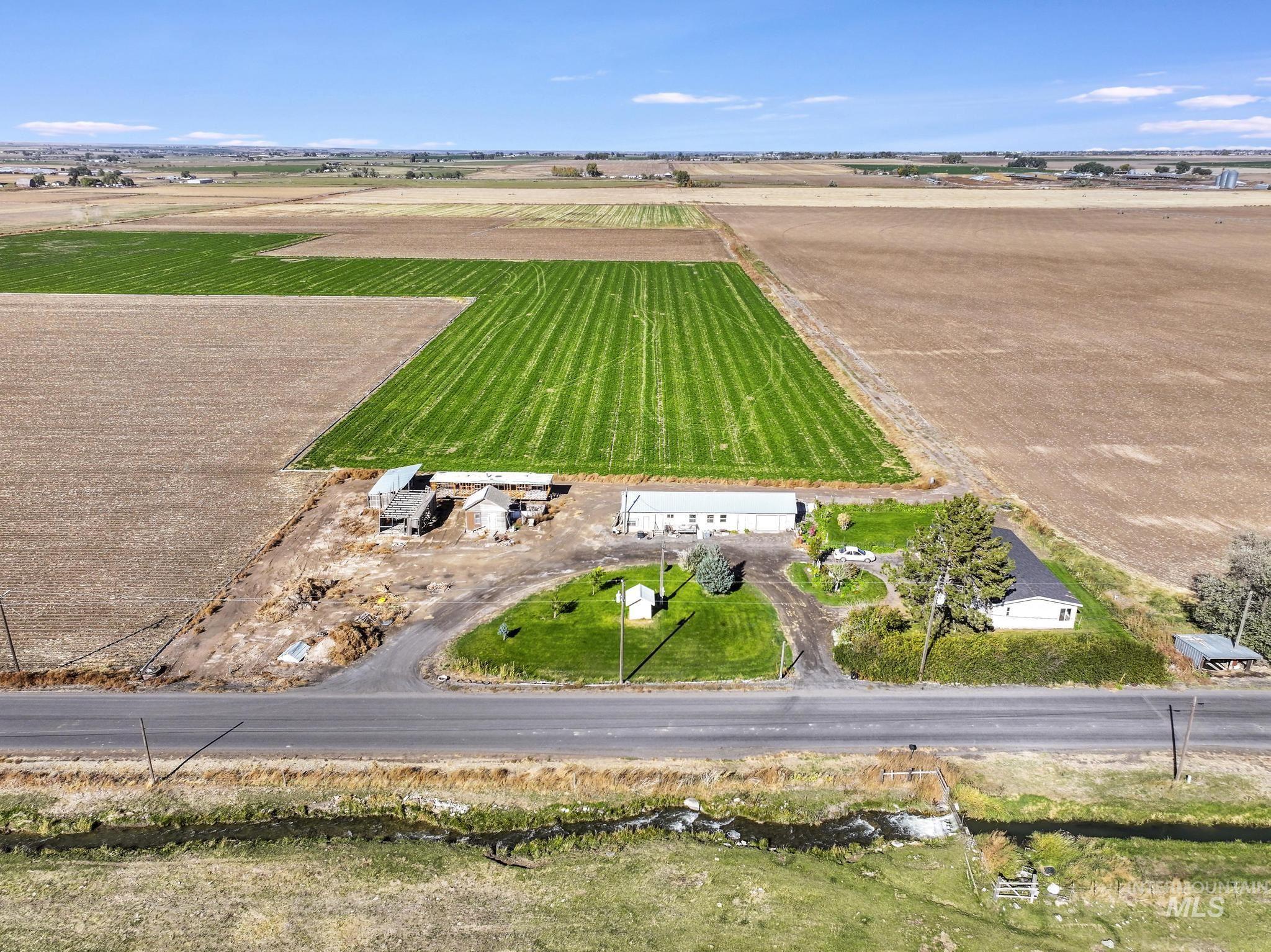 Aerial view of sparsely populated area featuring farmland