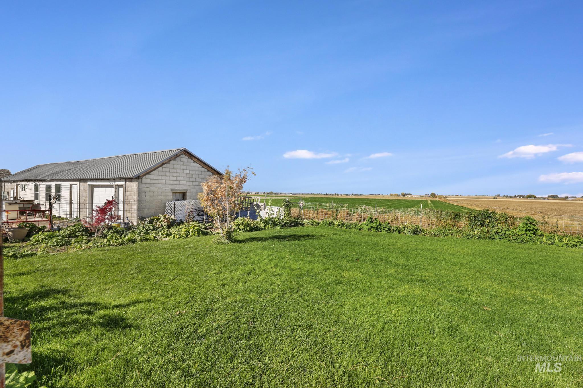View of yard featuring a view of rural / pastoral area
