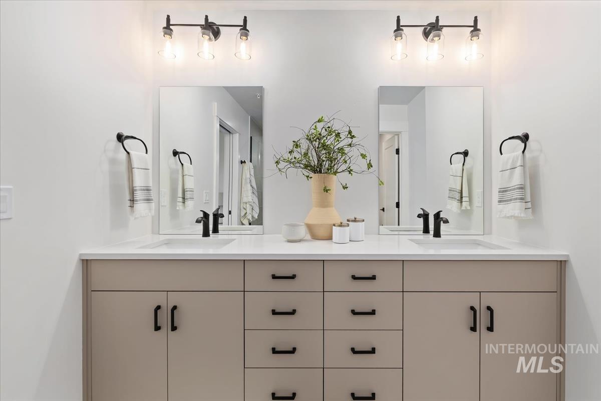 Bathroom featuring double vanity