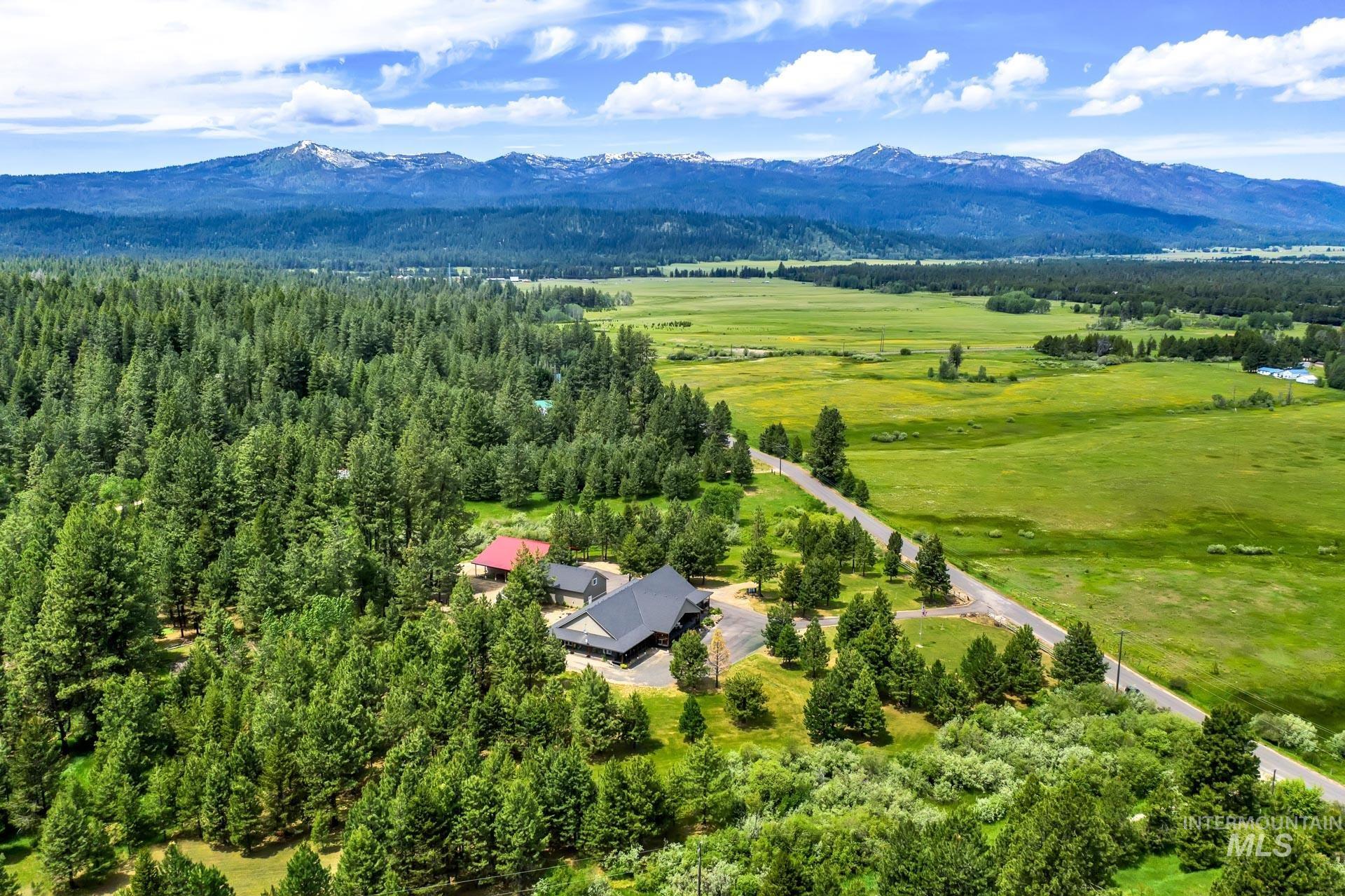 Aerial View of property featuring mountain views and scenic views of the valley