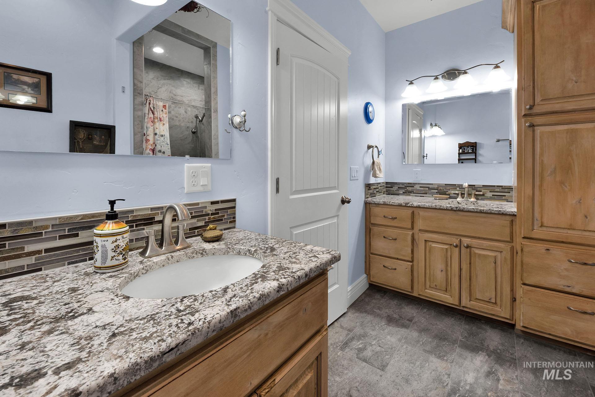 Primary Bath Suite features separate His and Her vanities