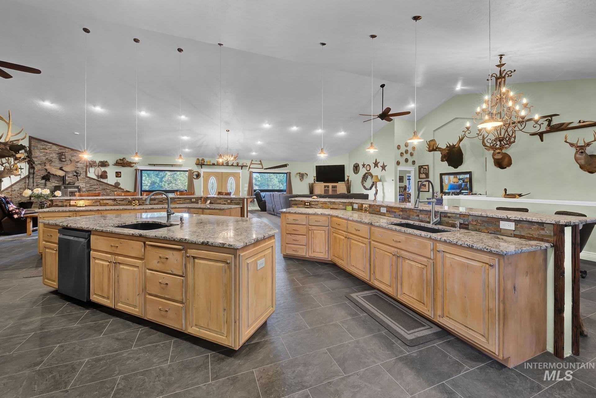 Center Island with extra sink - granite counters and extra cabinetry