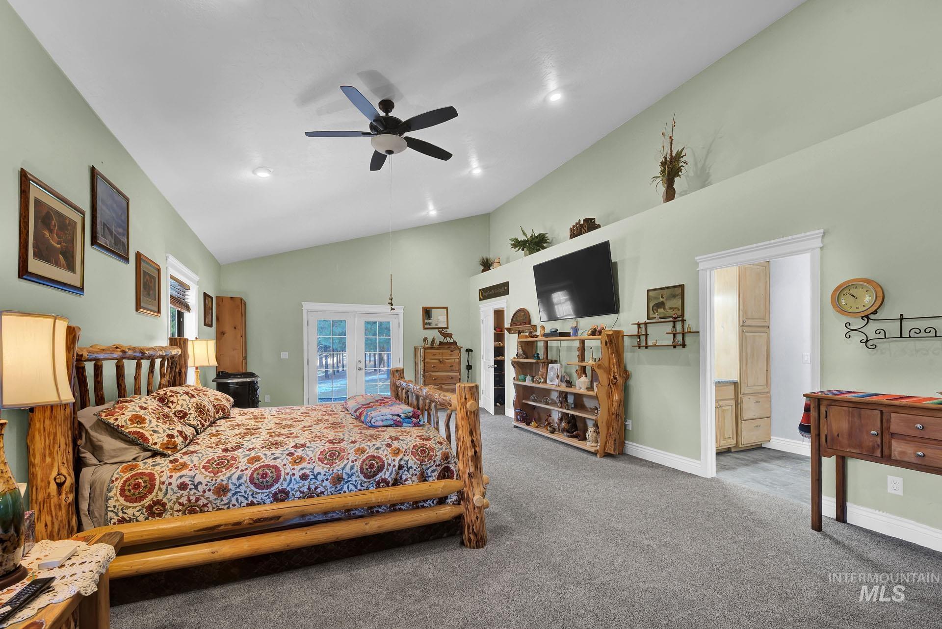 Primary Suite hosts vaulted ceilings - plant accent shelf