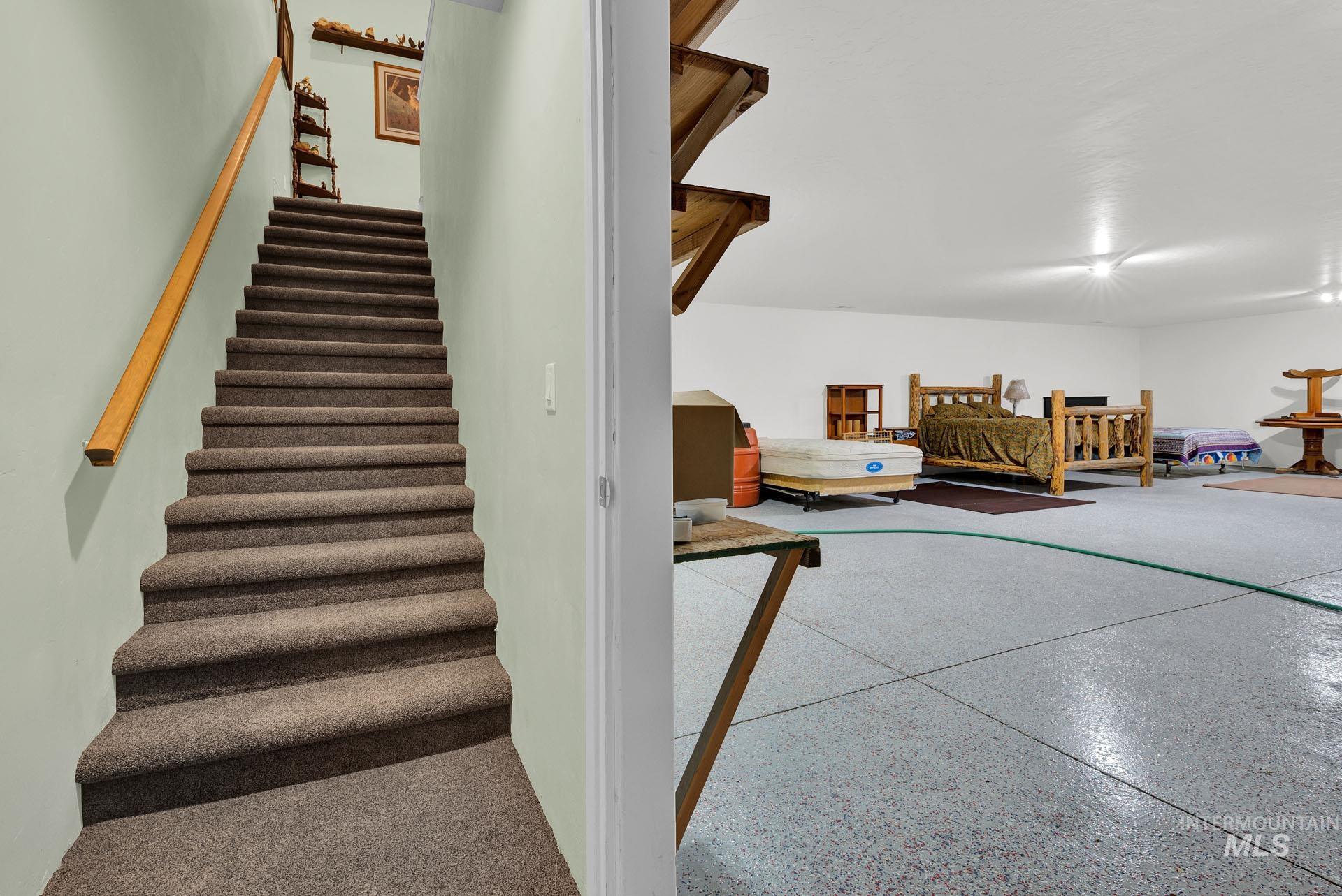 Basement area with walk out door access and sealed flooring