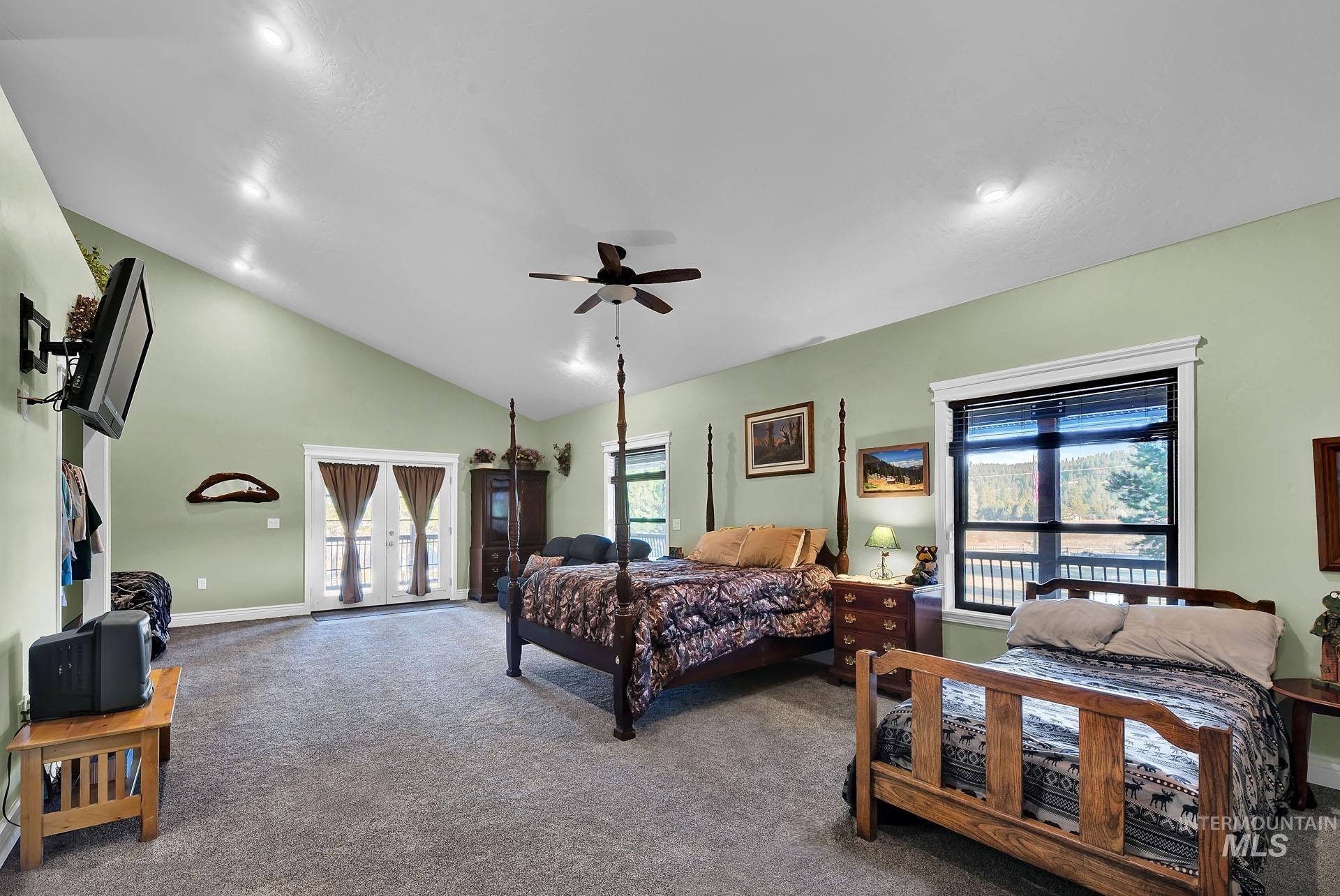 Bedroom Suite with French Doors to the covered walk way and vaulted ceilings