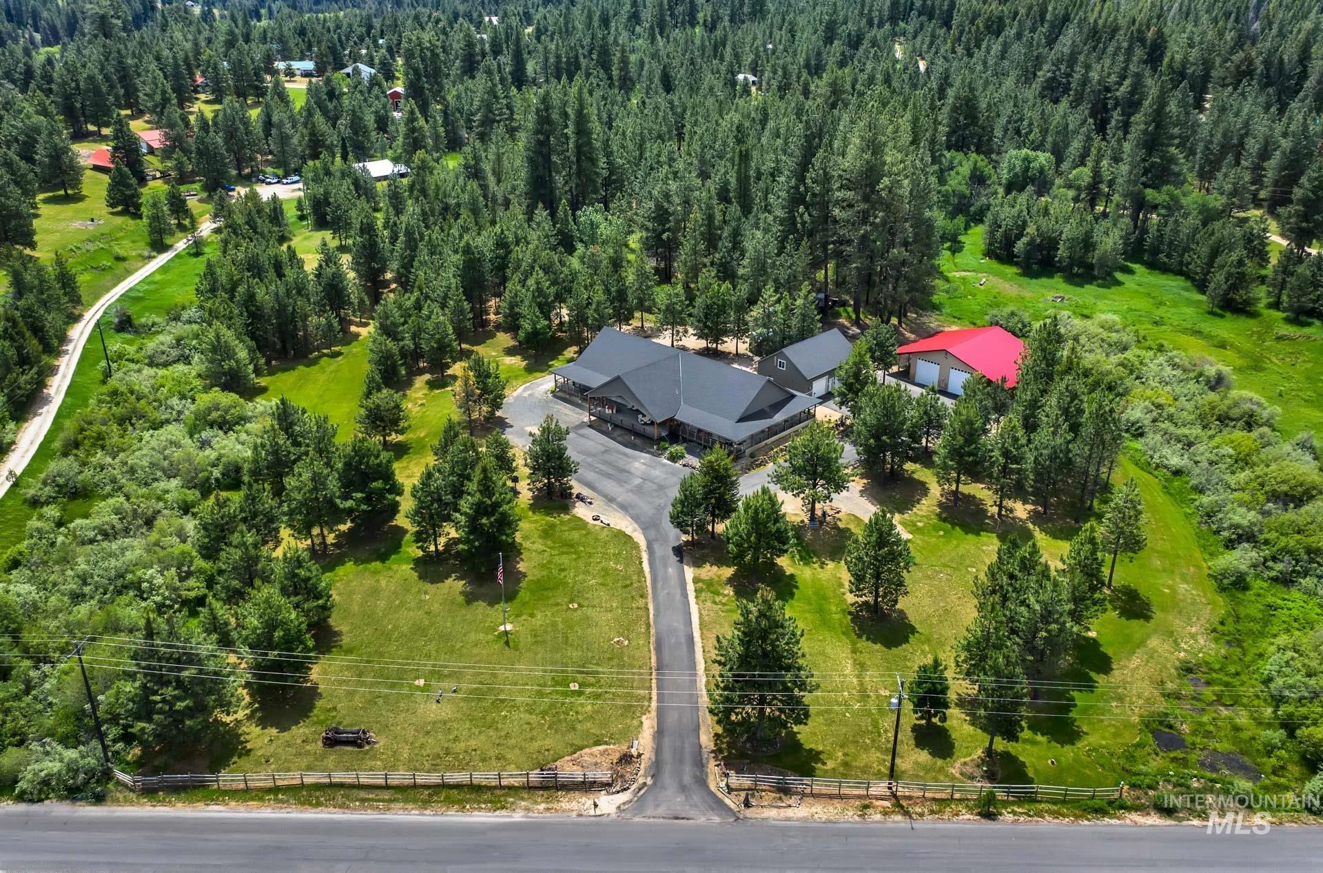 Overhead view of the acreage and surrounding trees
