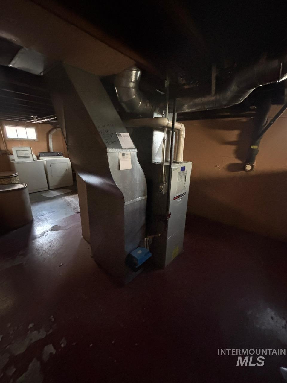 Utilities with separate washer and dryer and heating unit