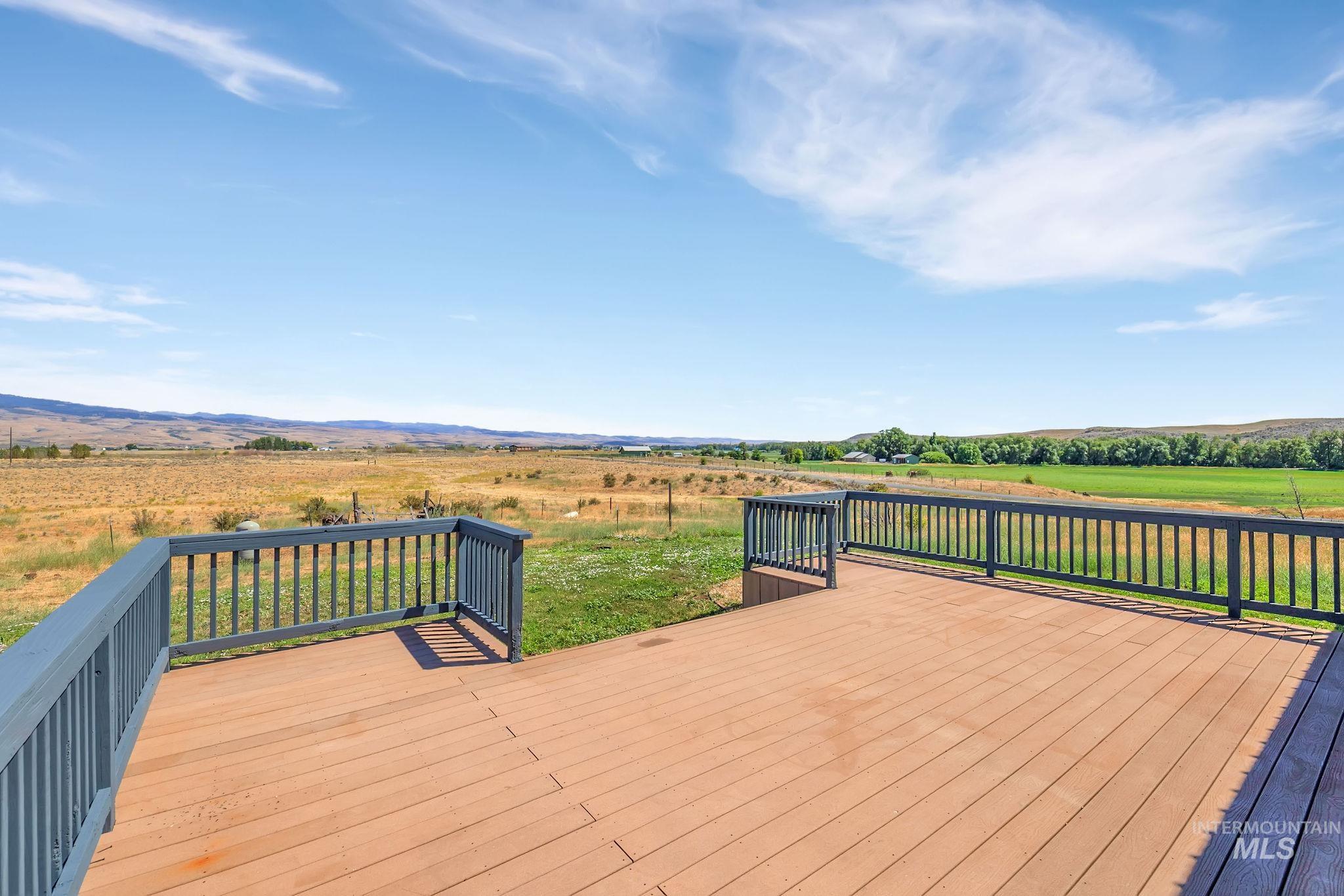 Deck with a view of countryside