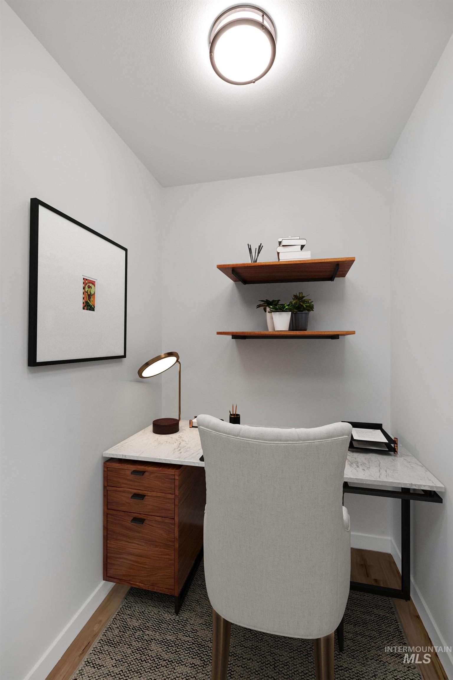 Home office featuring wood finished floors