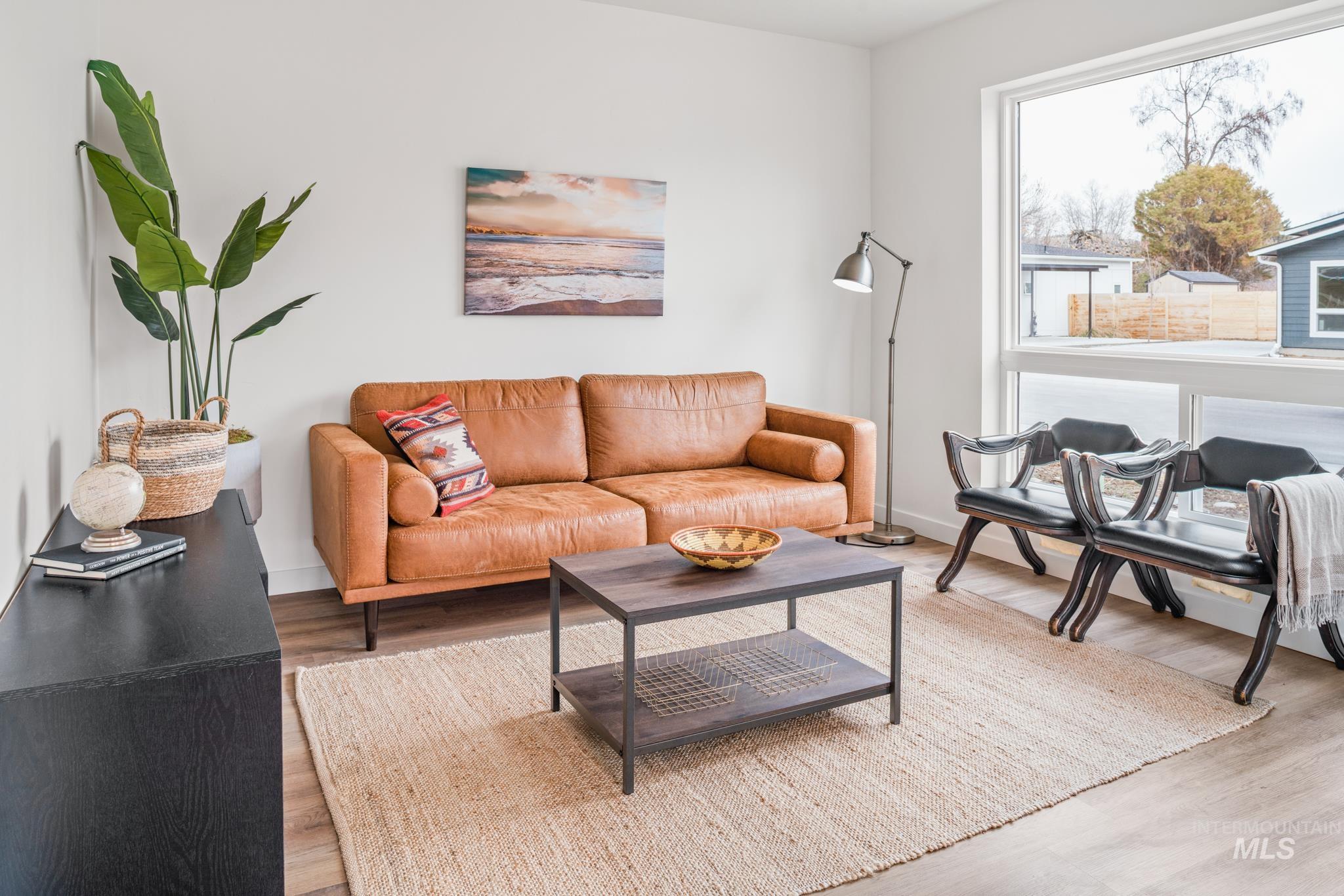 Living area with light wood-style flooring