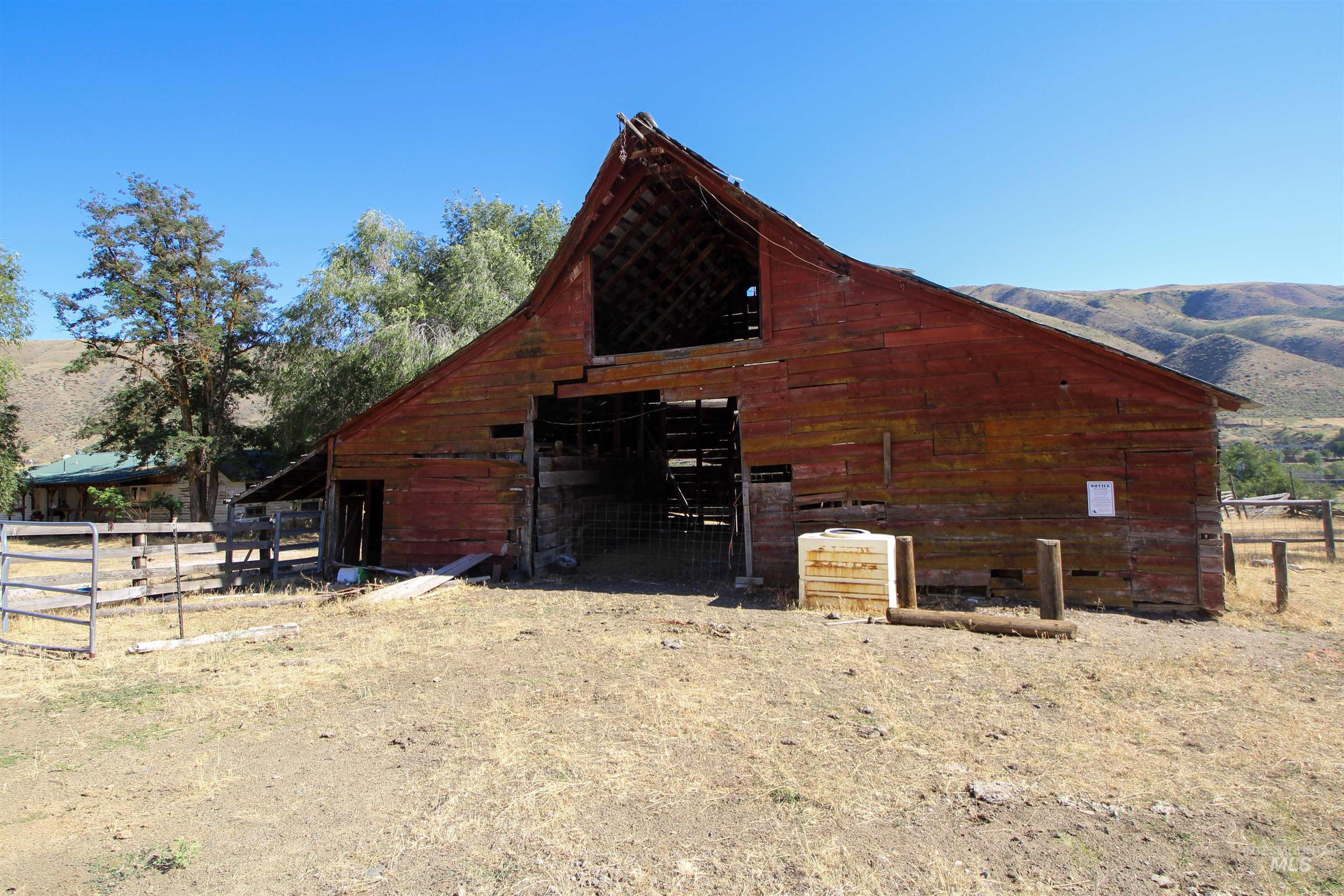View of barn featuring a mountain view