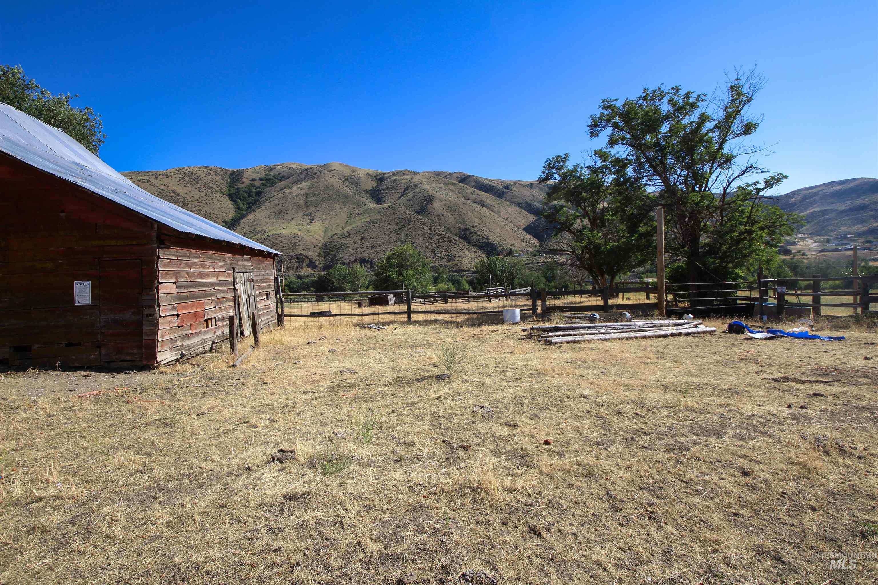 View of yard with a mountain view and a view of countryside