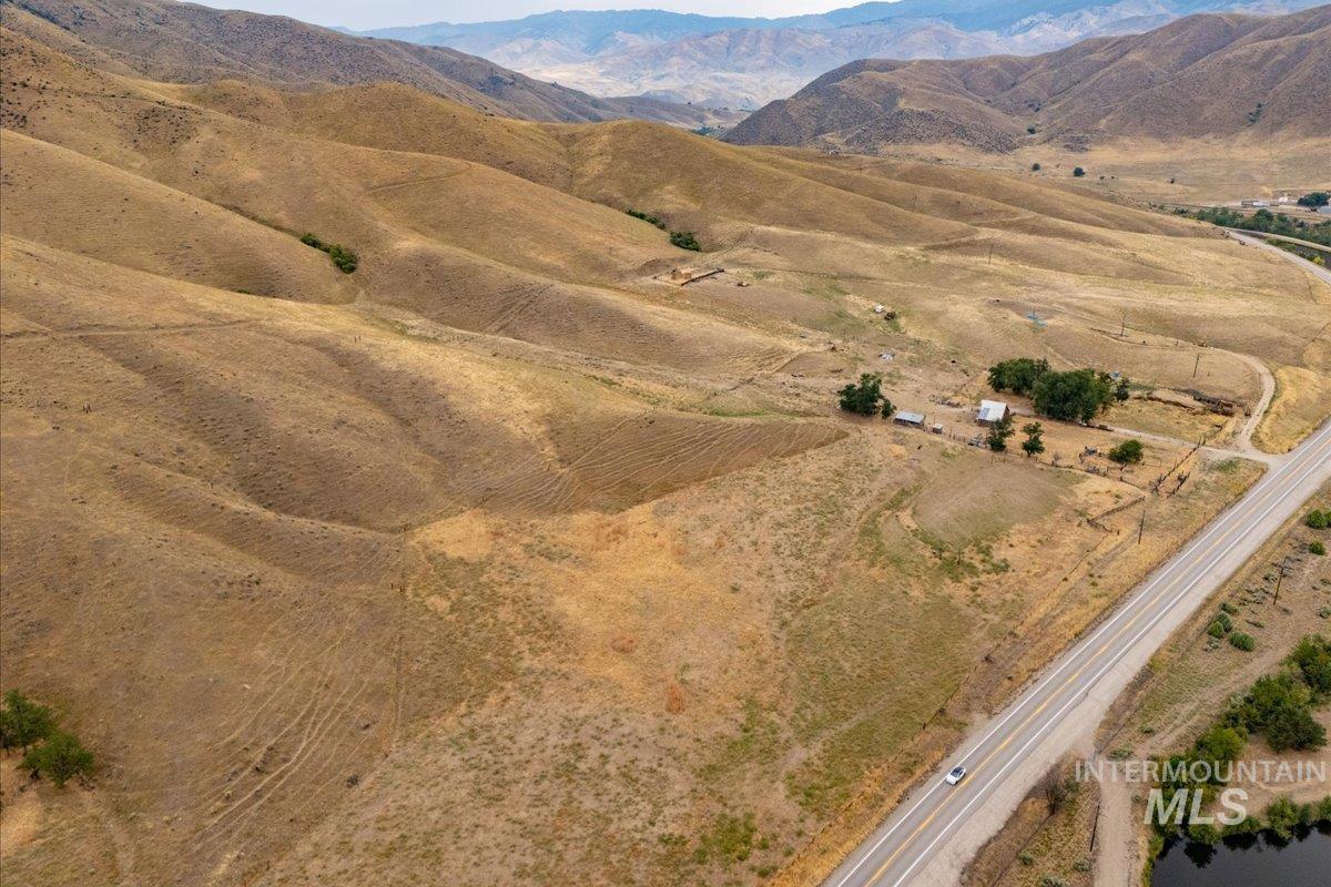 View of mountain backdrop featuring rural landscape