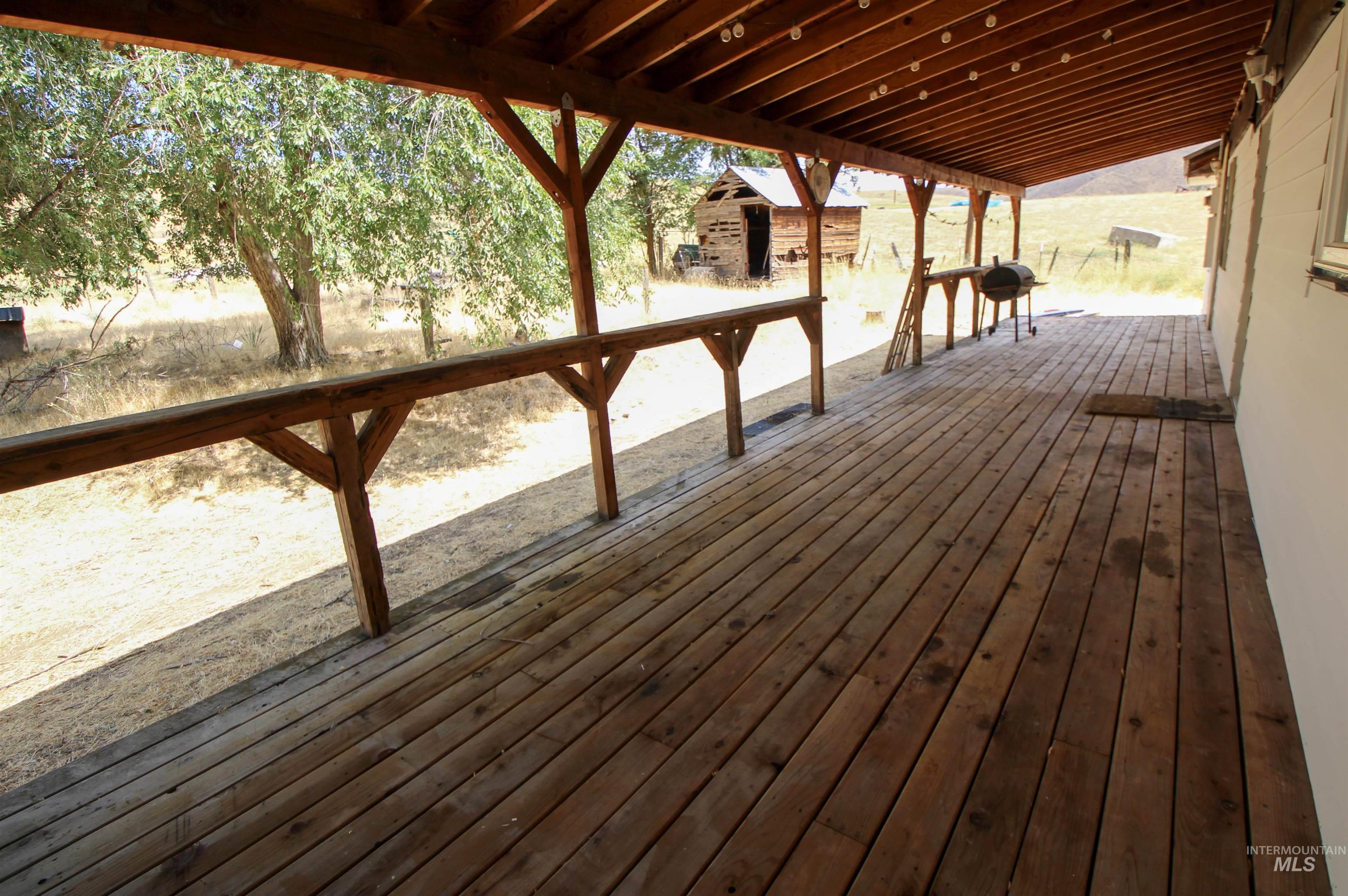 Wooden deck with a storage unit