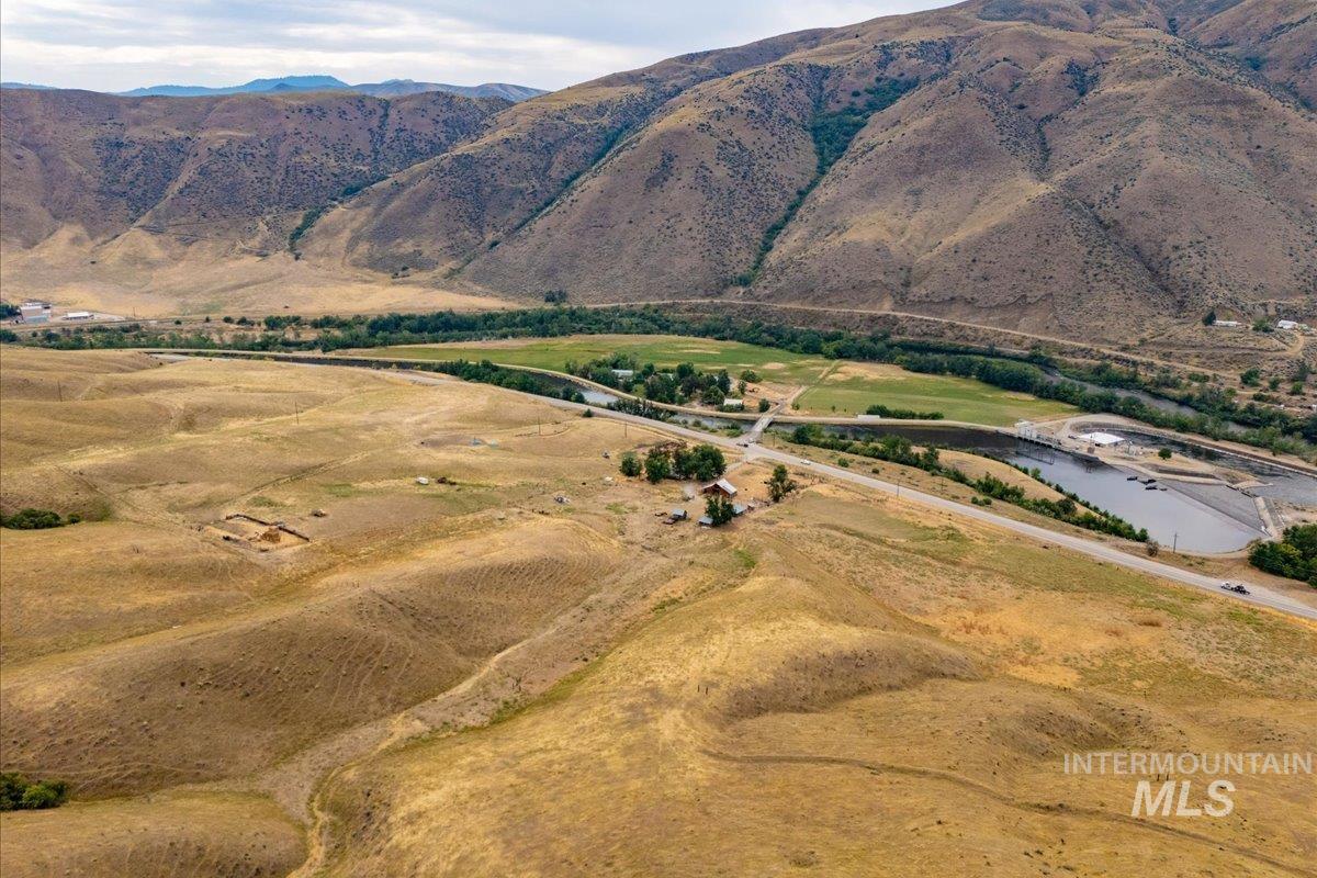 View of mountain background featuring rural landscape