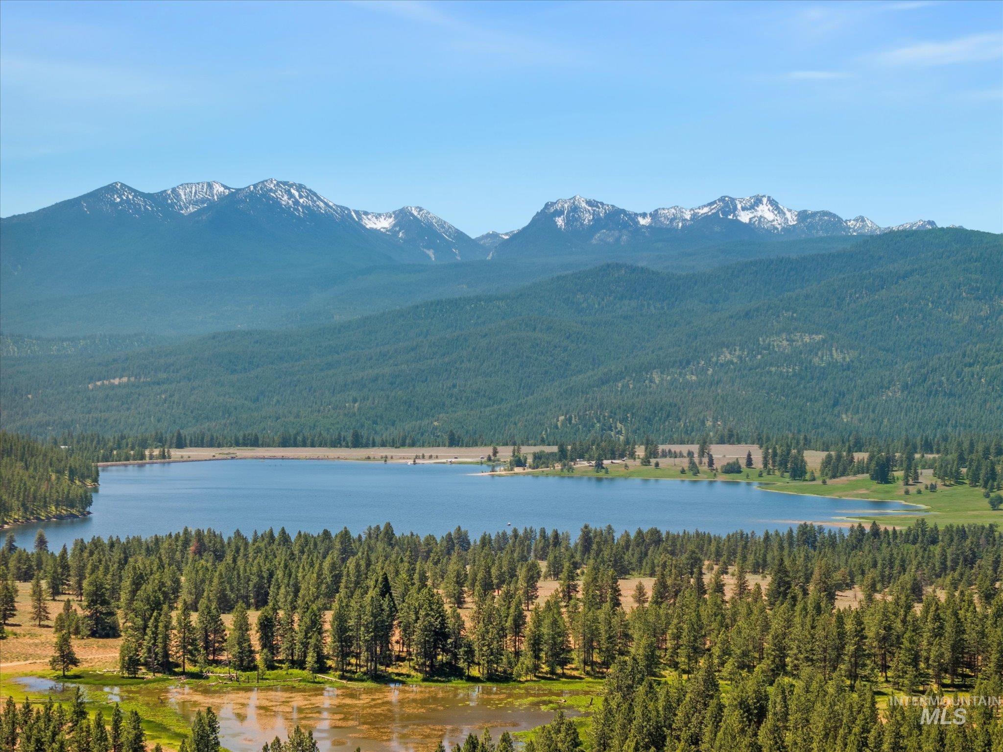 View of mountain backdrop with a large body of water