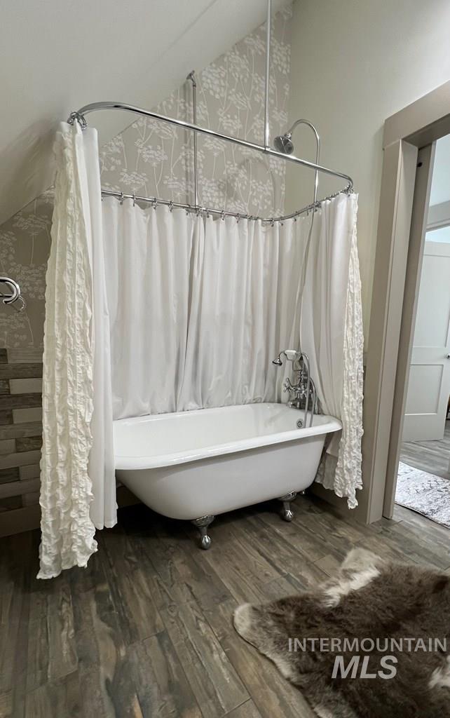 Bathroom with dark wood-type flooring