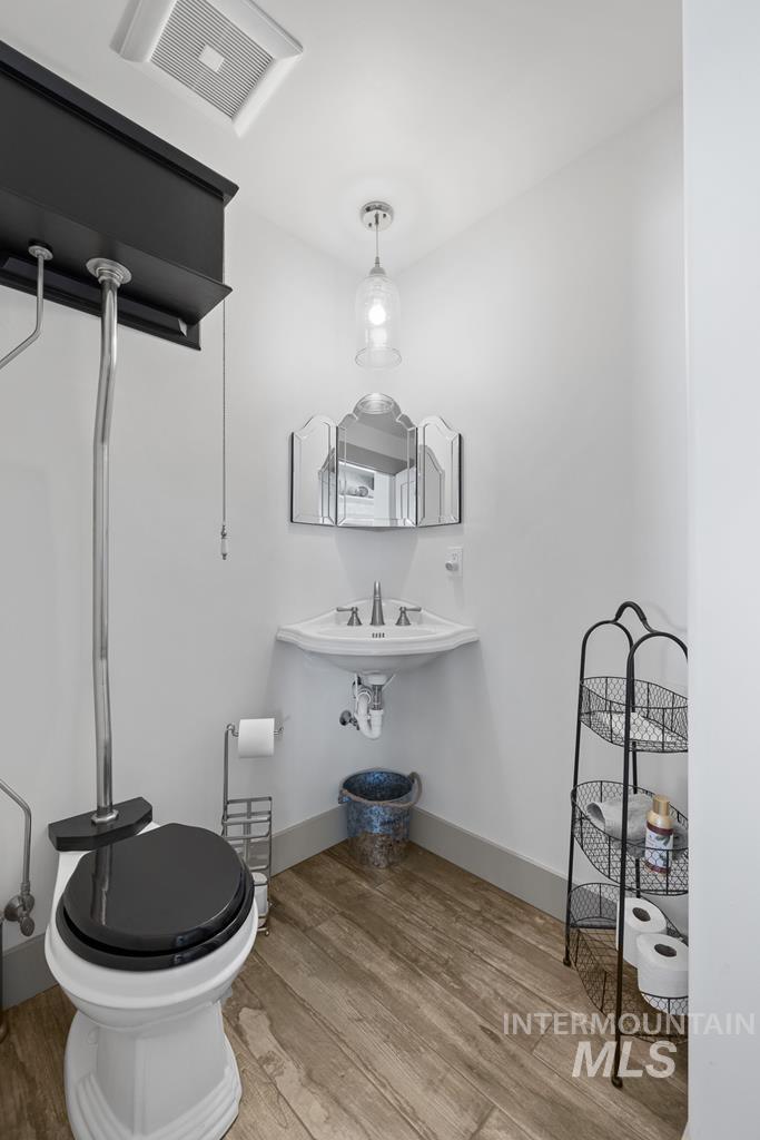 Bathroom featuring light wood-style flooring