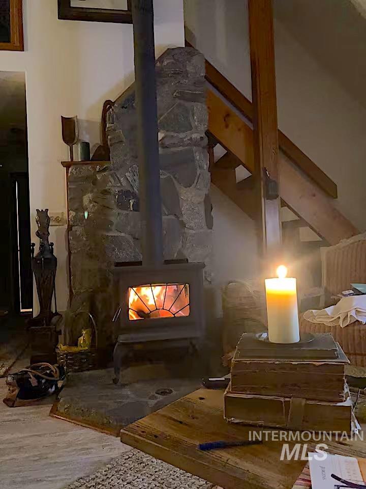 Detailed view of a wood stove and wood finished floors